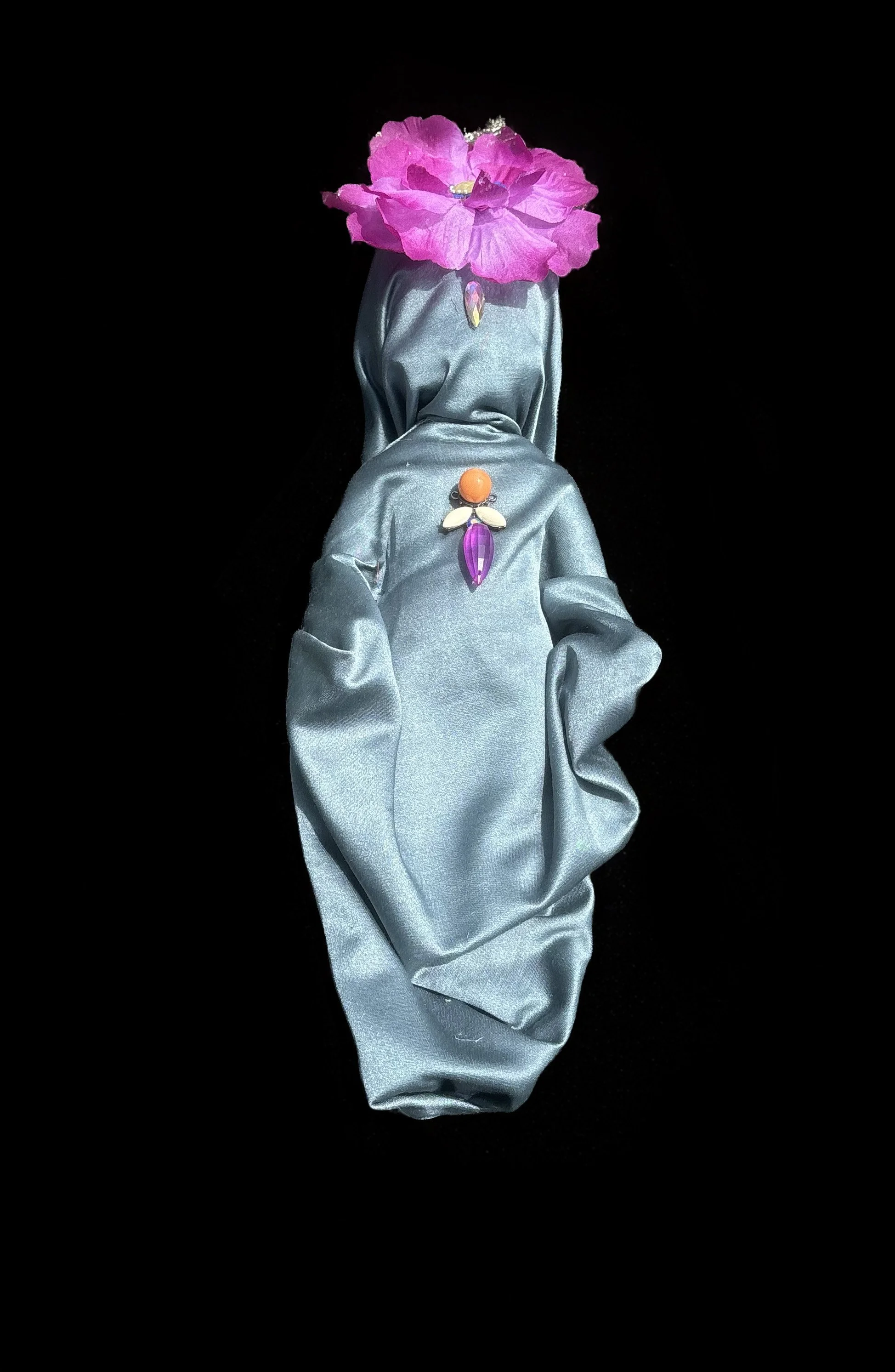  Ascension Spirit   
Soft Sculpture 
 Found Materials   
Discarded Doll, Fabric,  
Found Natural Materials,  
Costume Jewelry, Plastic Gems
