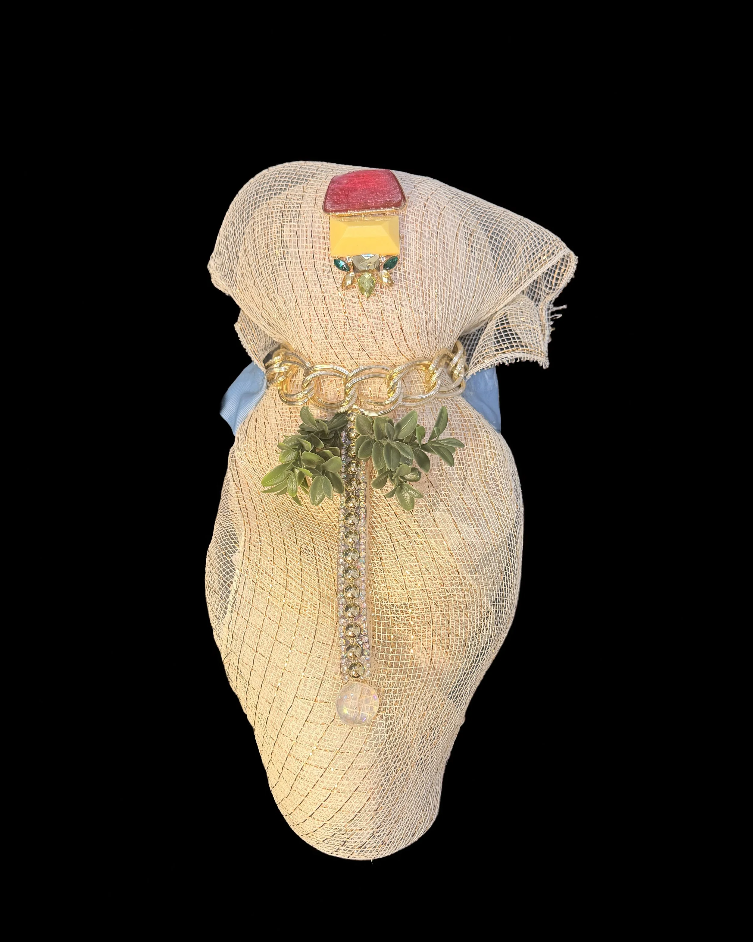  Ascension Spirit   
Soft Sculpture 
 Found Materials   
Discarded Doll, Fabric,  
Found Natural Materials,  
Costume Jewelry, Plastic Gems