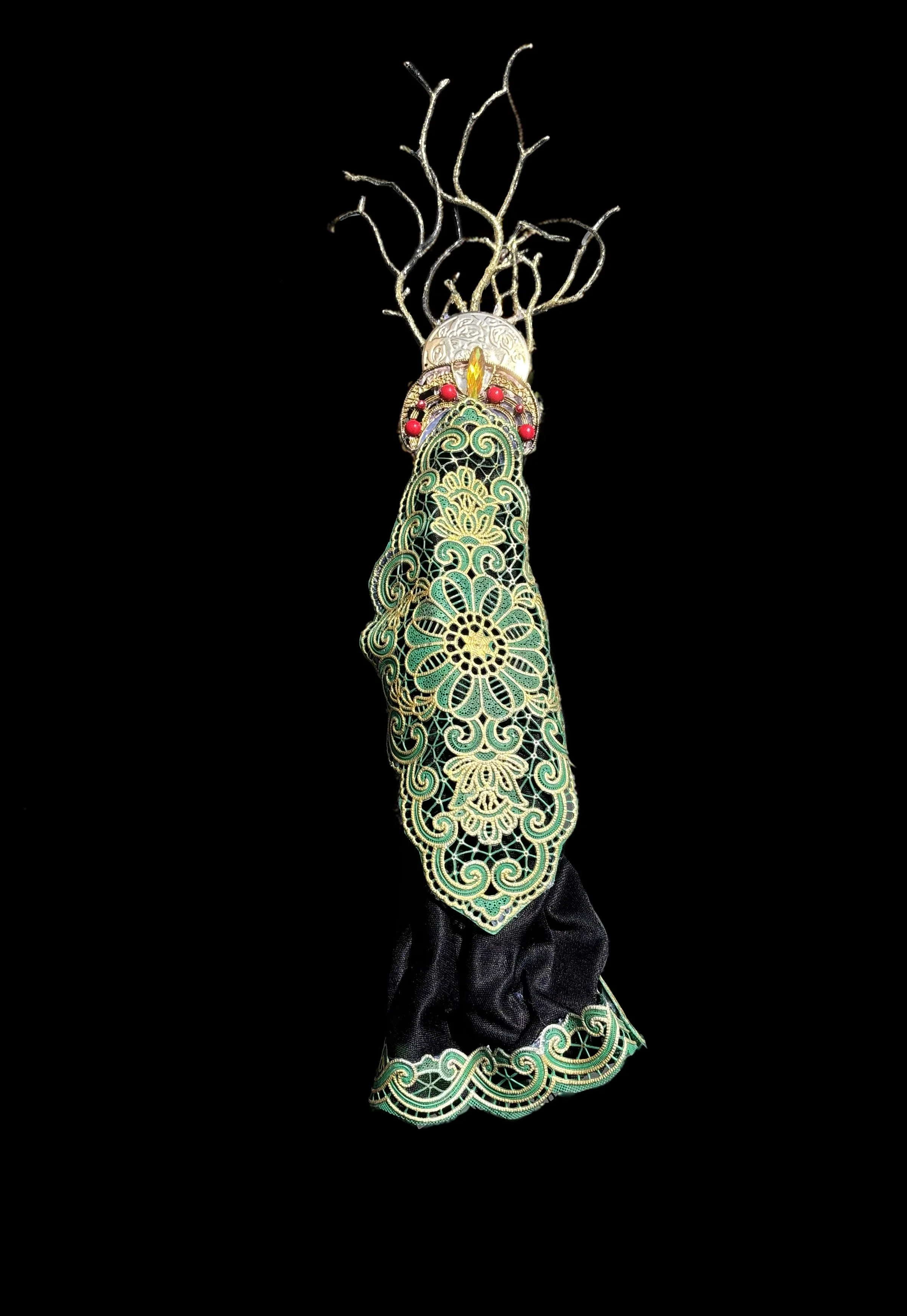  Ascension Spirit   
Soft Sculpture 
 Found Materials   
Discarded Doll, Fabric,  
Found Natural Materials,  
Costume Jewelry, Plastic Gems