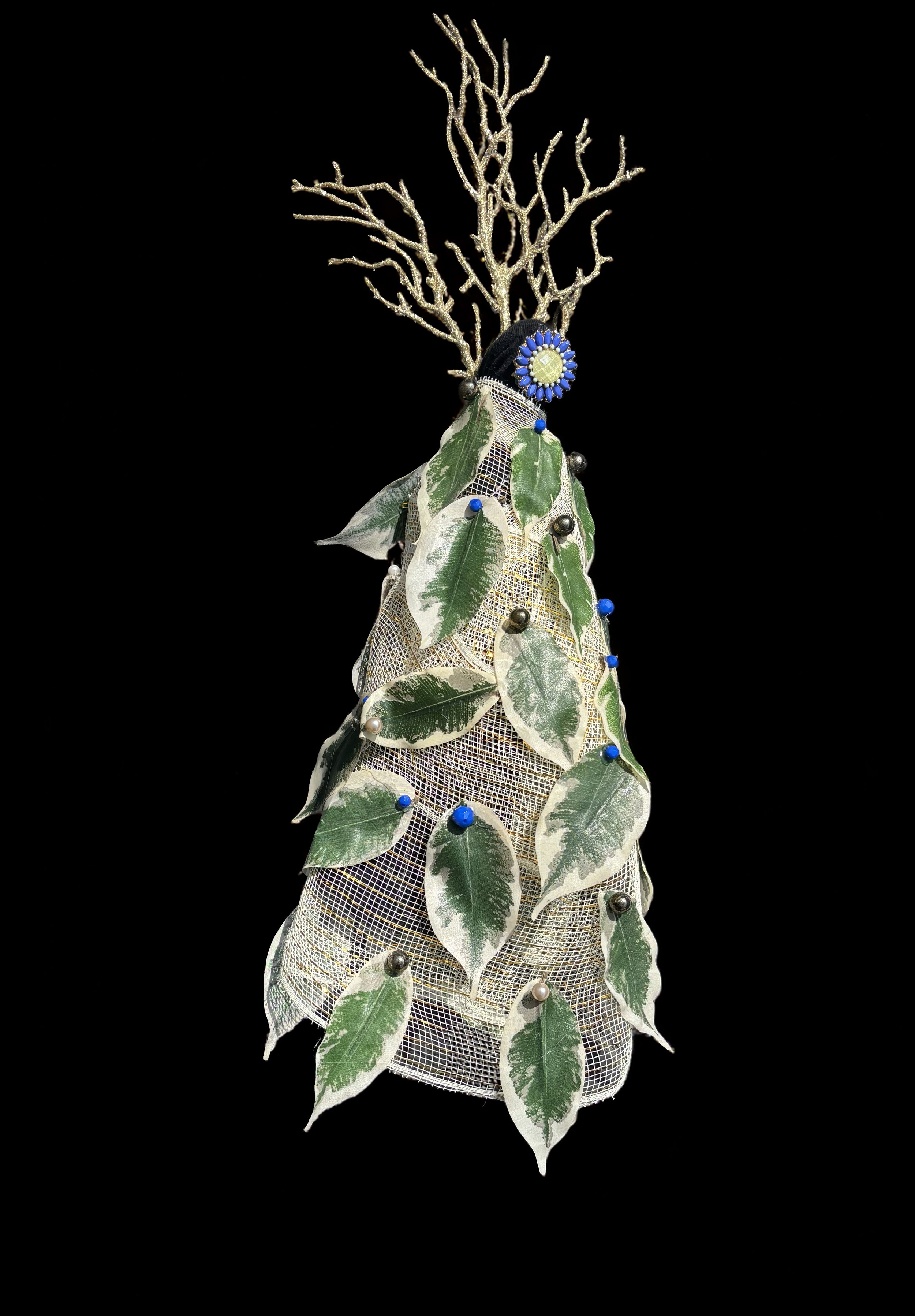  Ascension Spirit   
Soft Sculpture 
 Found Materials   
Discarded Doll, Fabric,  
Found Natural Materials,  
Costume Jewelry, Plastic Gems