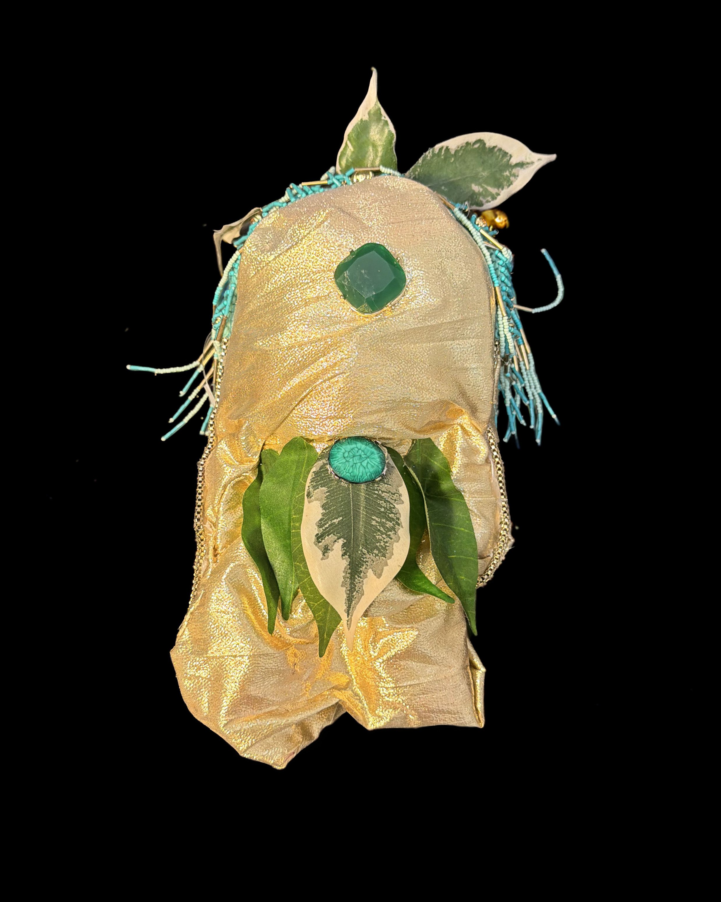  Ascension Spirit   
Soft Sculpture 
 Found Materials   
Discarded Doll, Fabric,  
Found Natural Materials,  
Costume Jewelry, Plastic Gems