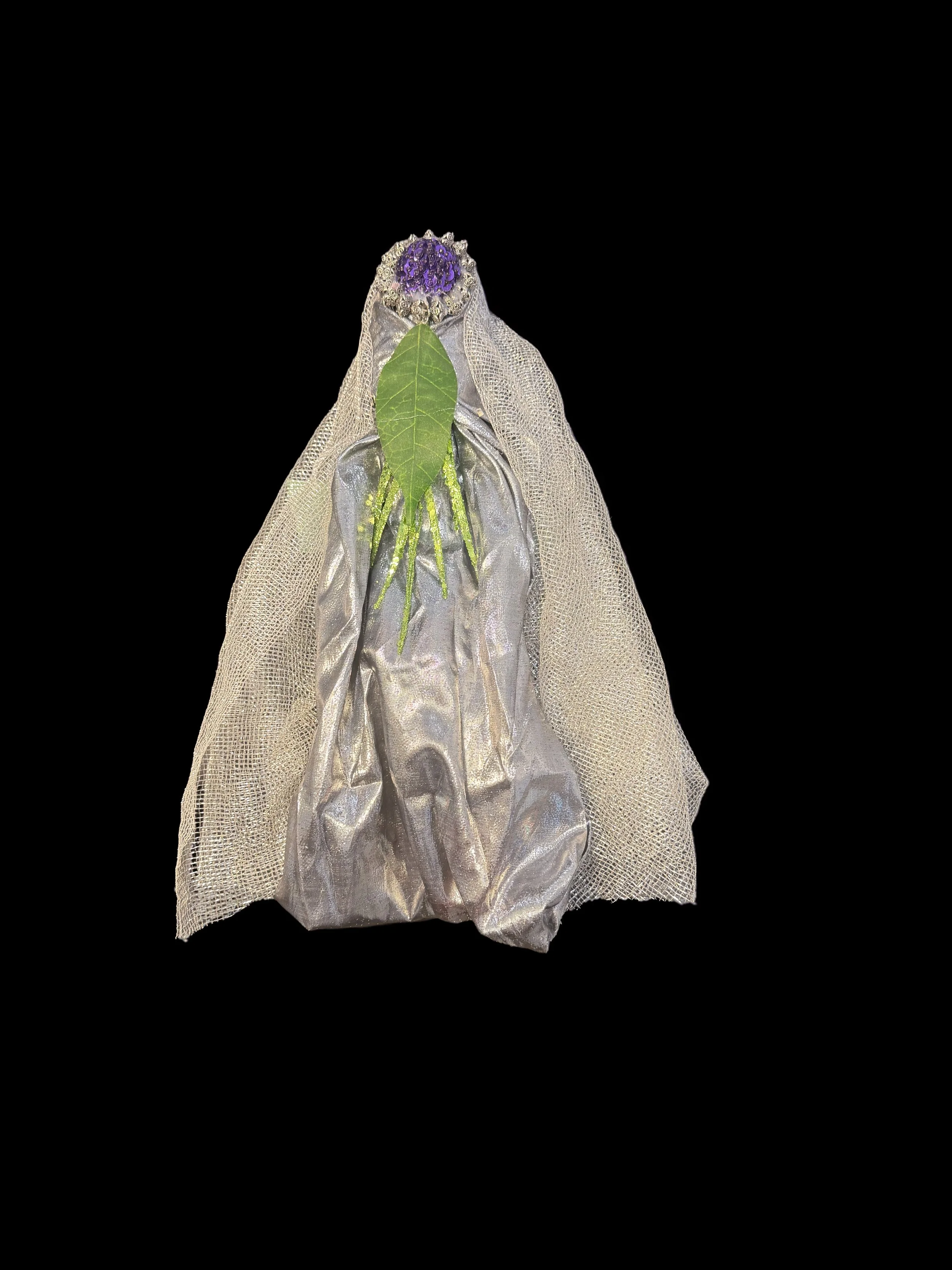  Ascension Spirit   
Soft Sculpture 
 Found Materials   
Discarded Doll, Fabric,  
Found Natural Materials,  
Costume Jewelry, Plastic Gems