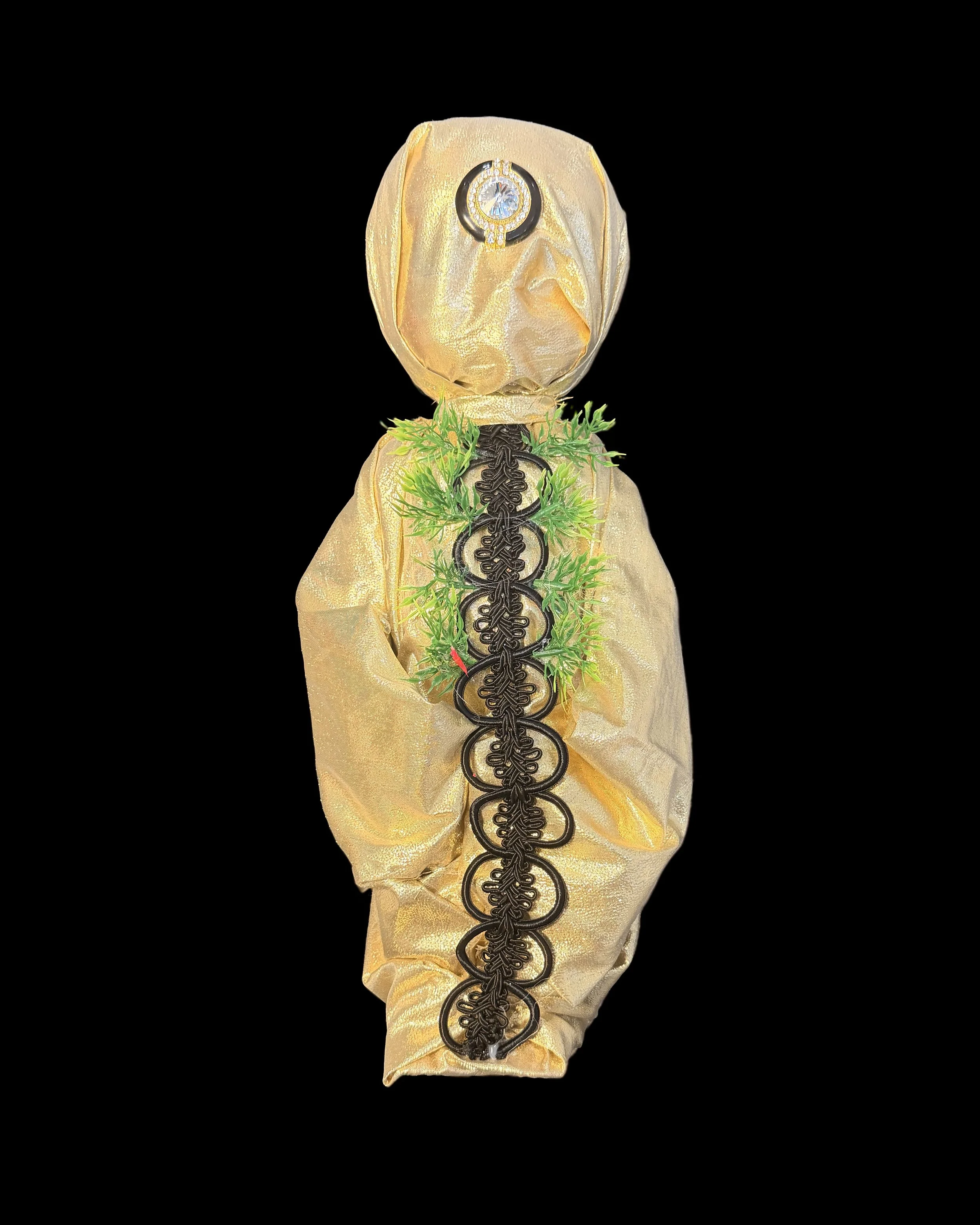  Ascension Spirit   
Soft Sculpture 
 Found Materials   
Discarded Doll, Fabric,  
Found Natural Materials,  
Costume Jewelry, Plastic Gems