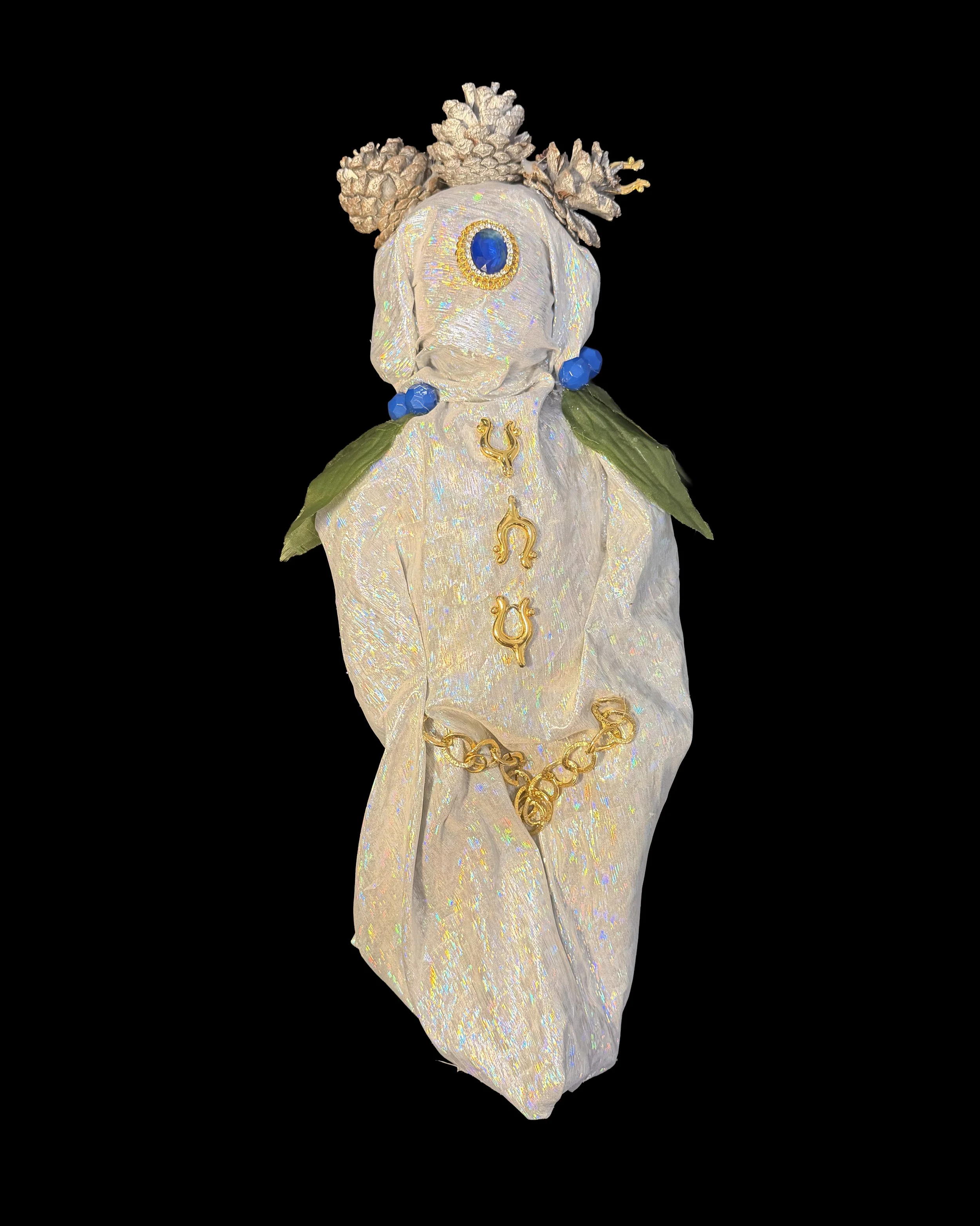  Ascension Spirit   
Soft Sculpture 
 Found Materials   
Discarded Doll, Fabric,  
Found Natural Materials,  
Costume Jewelry, Plastic Gems