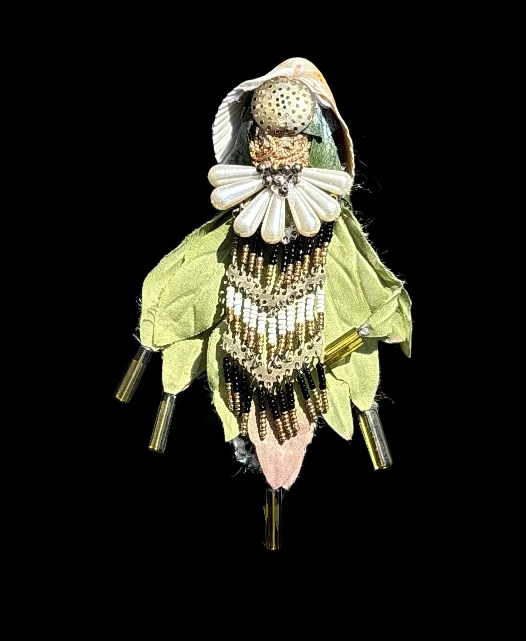  Ascension Spirit   
Soft Sculpture 
 Found Materials   
Discarded Doll, Fabric,  
Found Natural Materials,  
Costume Jewelry, Plastic Gems