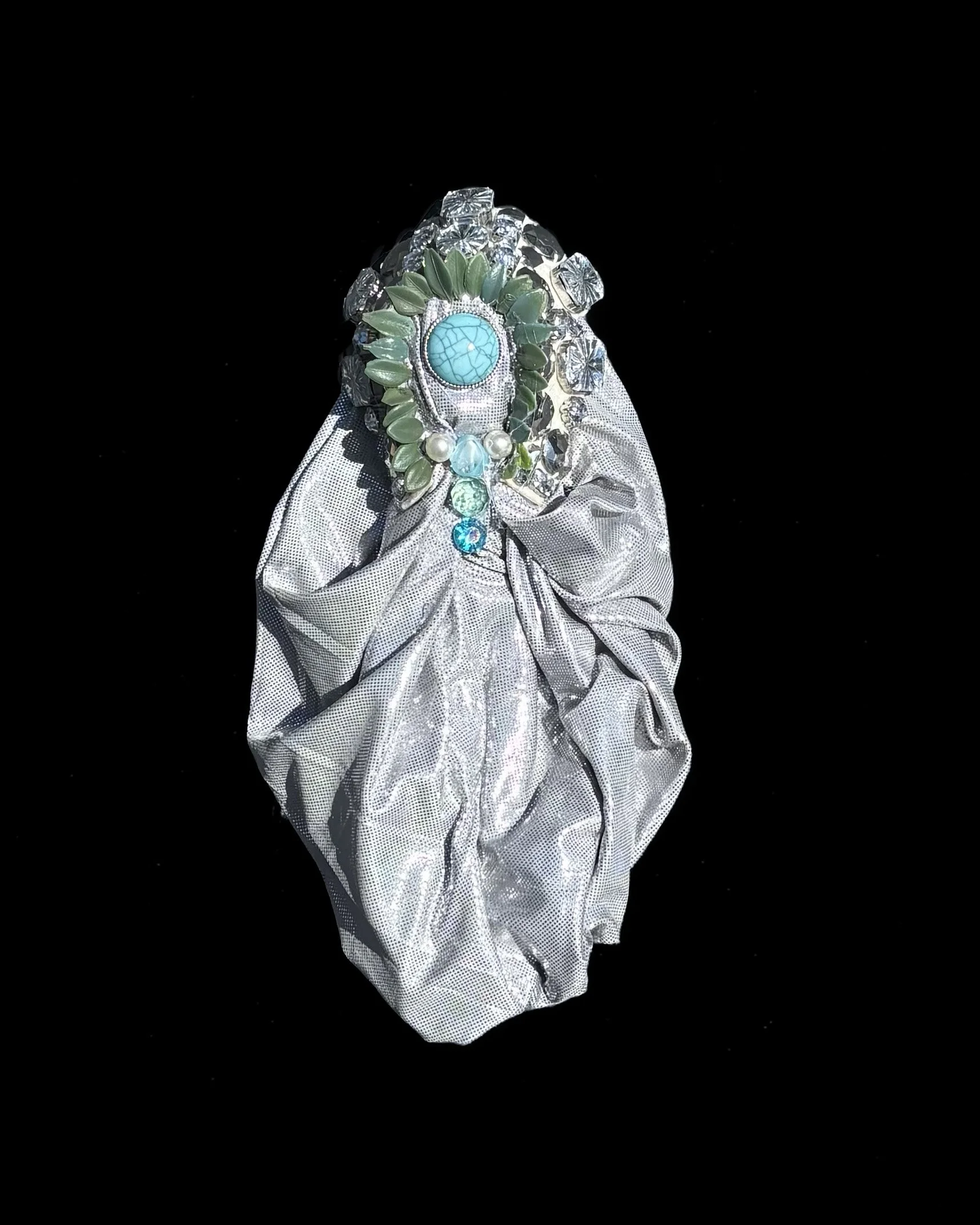  Ascension Spirit   
Soft Sculpture 
 Found Materials   
Discarded Doll, Fabric,  
Found Natural Materials,  
Costume Jewelry, Plastic Gems