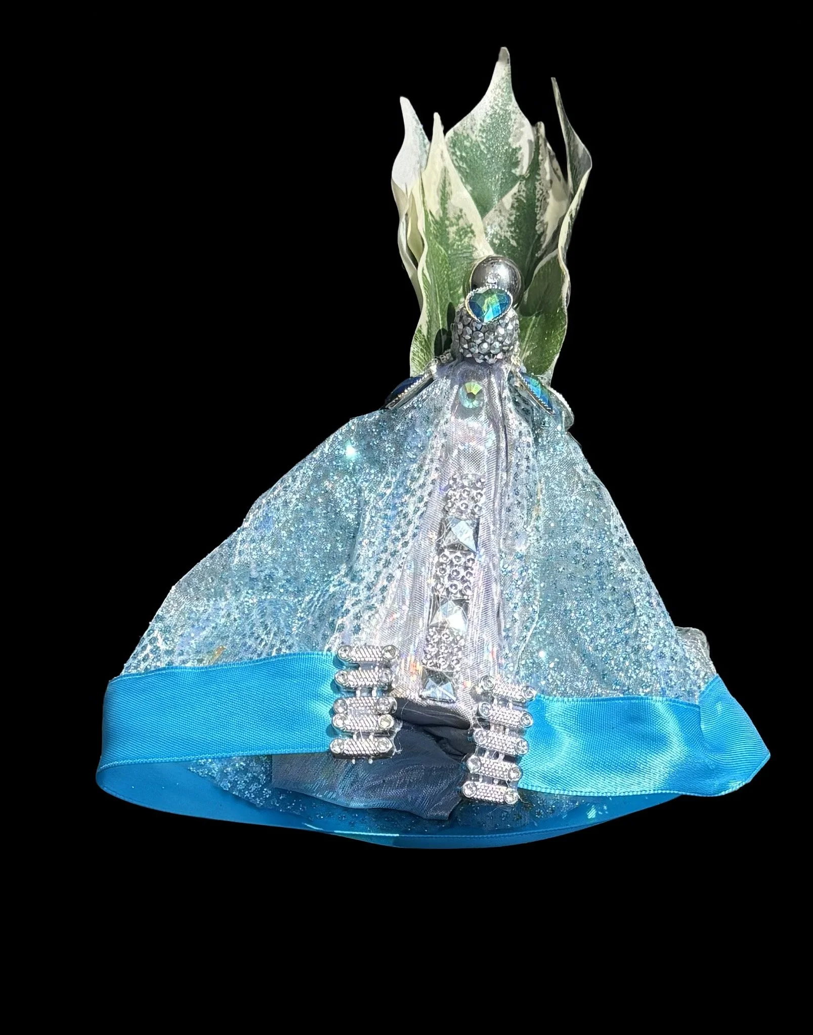  Ascension Spirit   
Soft Sculpture 
 Found Materials   
Discarded Doll, Fabric,  
Found Natural Materials,  
Costume Jewelry, Plastic Gems