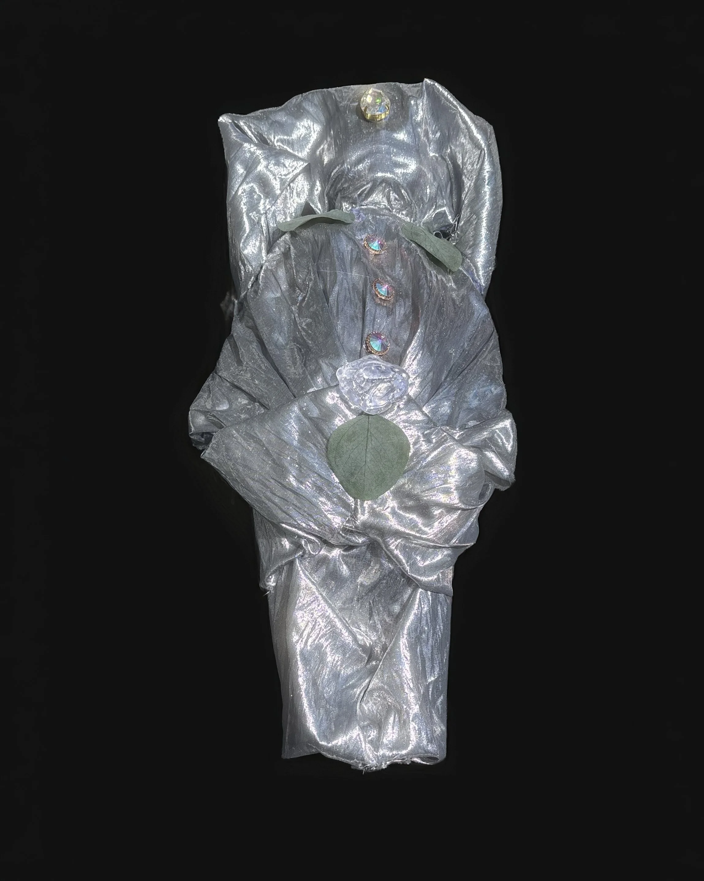  Ascension Spirit   
Soft Sculpture 
 Found Materials   
Discarded Doll, Fabric,  
Found Natural Materials,  
Costume Jewelry, Plastic Gems