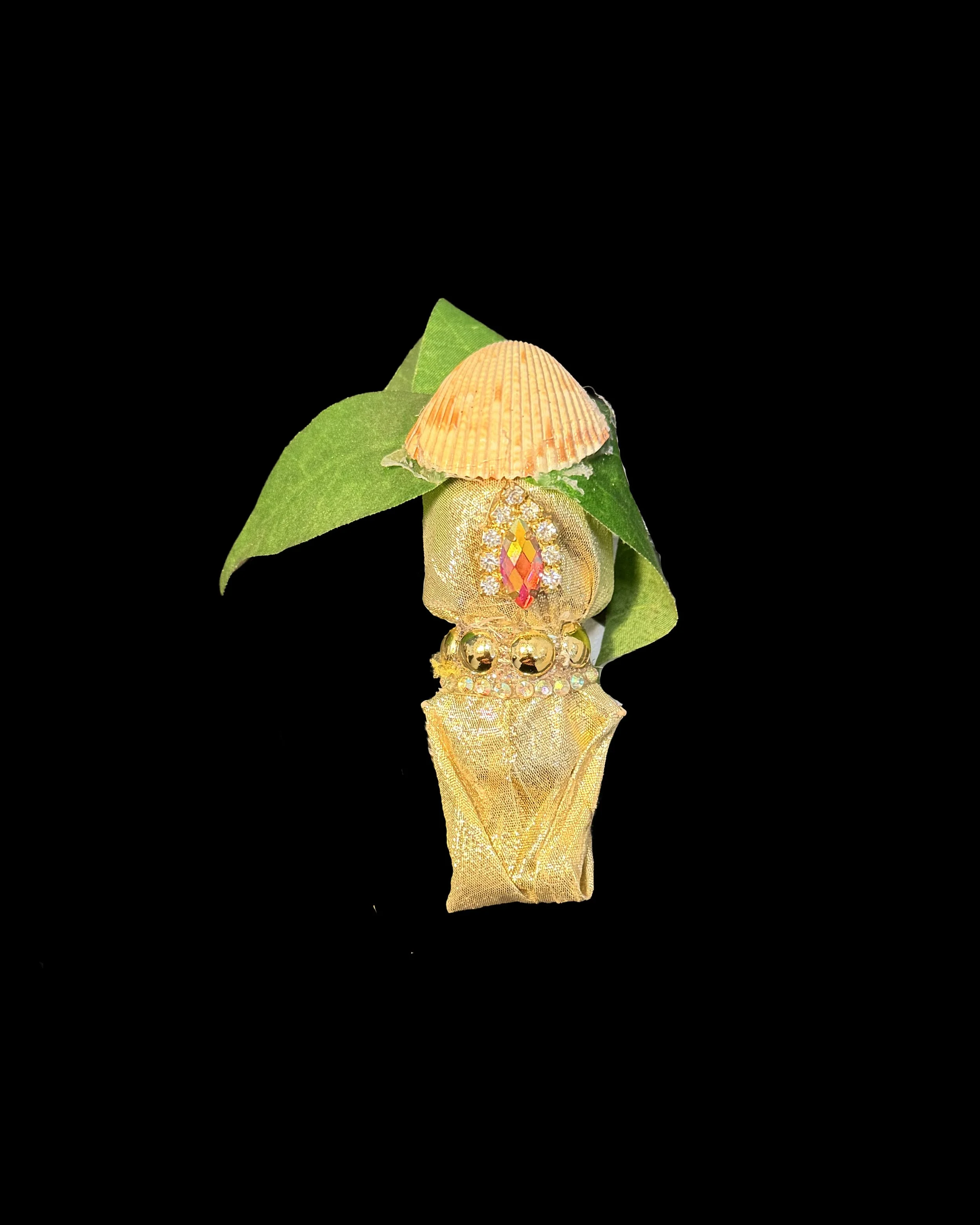  Ascension Spirit   
Soft Sculpture 
 Found Materials   
Discarded Doll, Fabric,  
Found Natural Materials,  
Costume Jewelry, Plastic Gems
