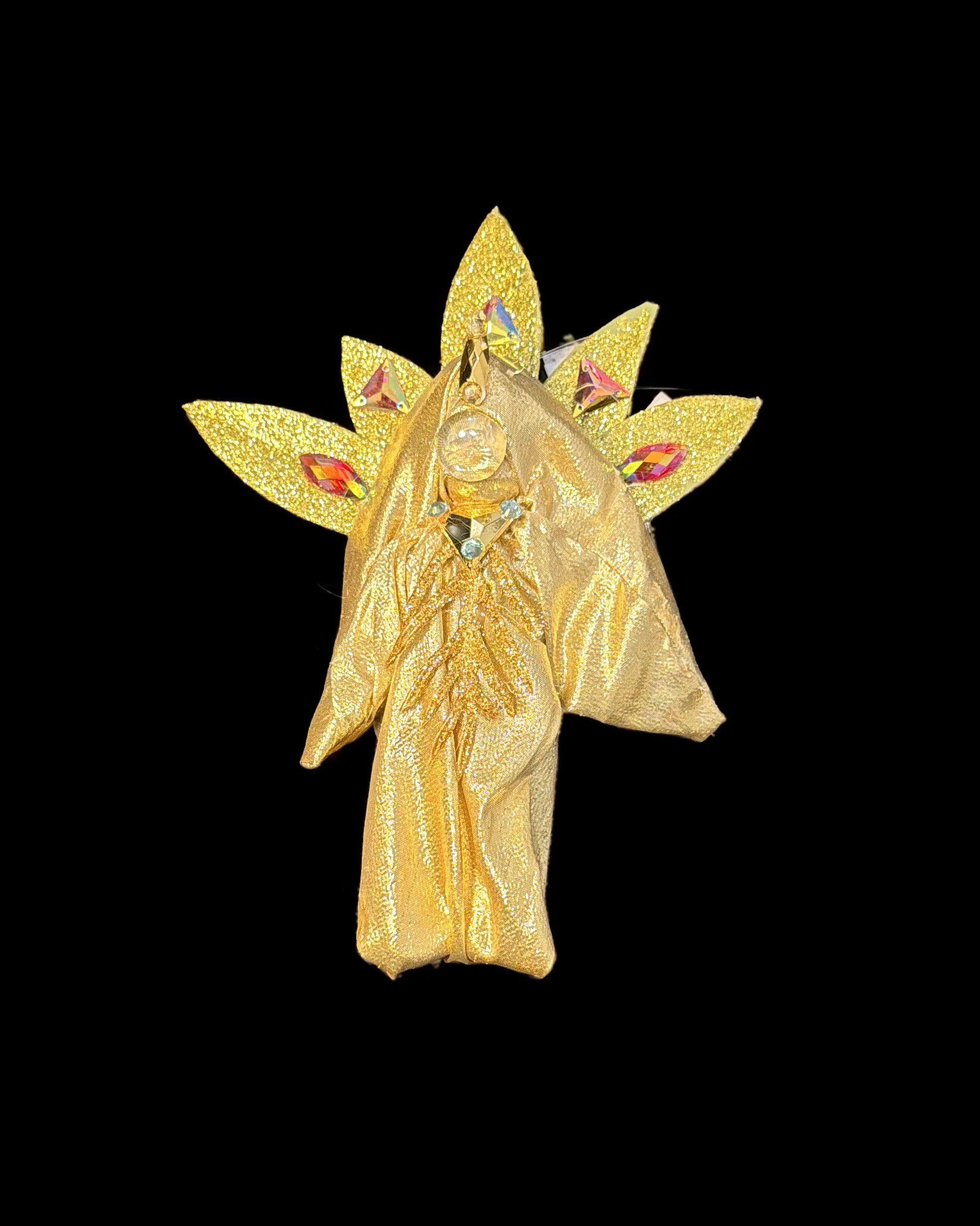  Ascension Spirit   
Soft Sculpture 
 Found Materials   
Discarded Doll, Fabric,  
Found Natural Materials,  
Costume Jewelry, Plastic Gems