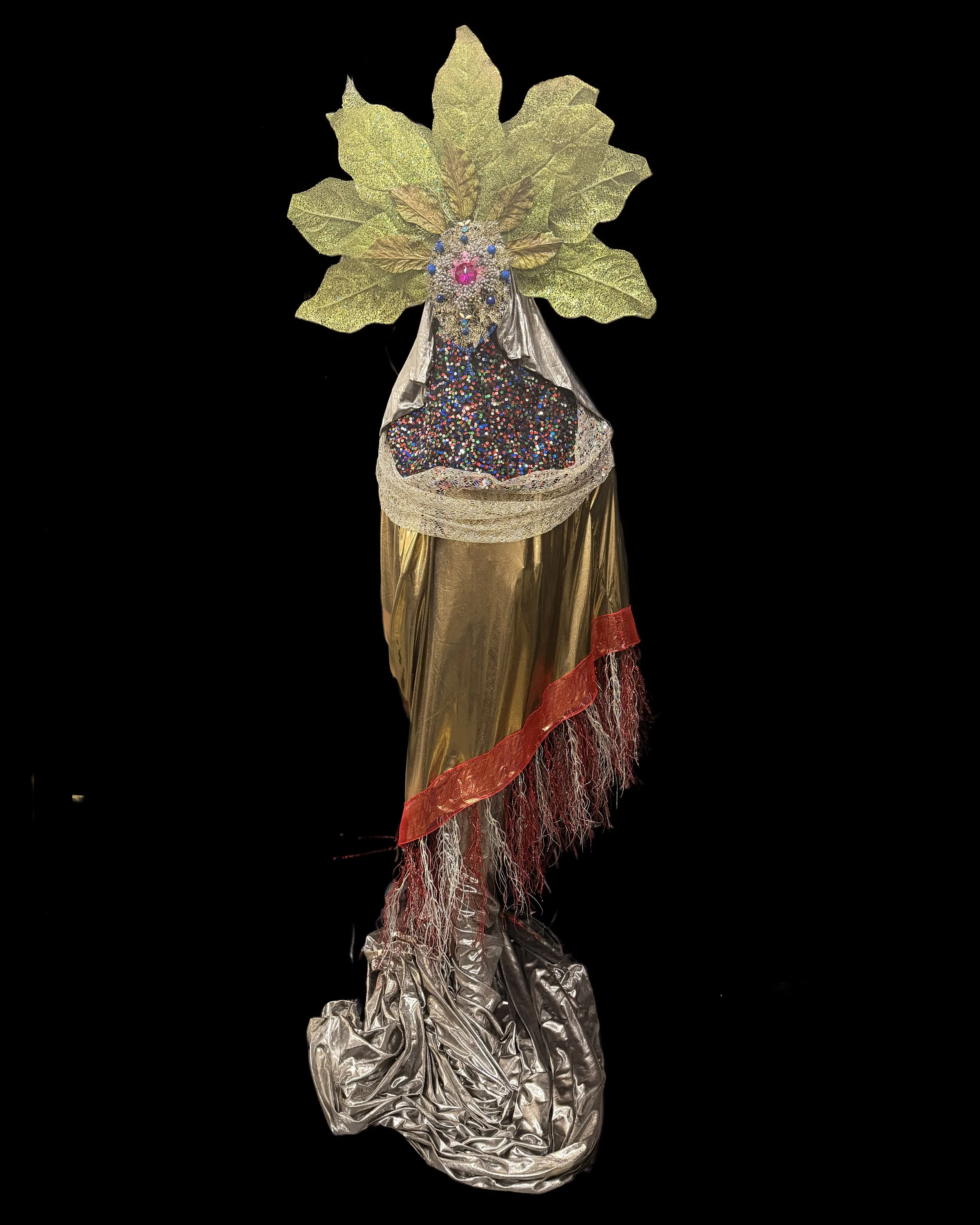  Ascension Spirit   
Soft Sculpture 
 Found Materials   
Discarded Doll, Fabric,  
Found Natural Materials,  
Costume Jewelry, Plastic Gems