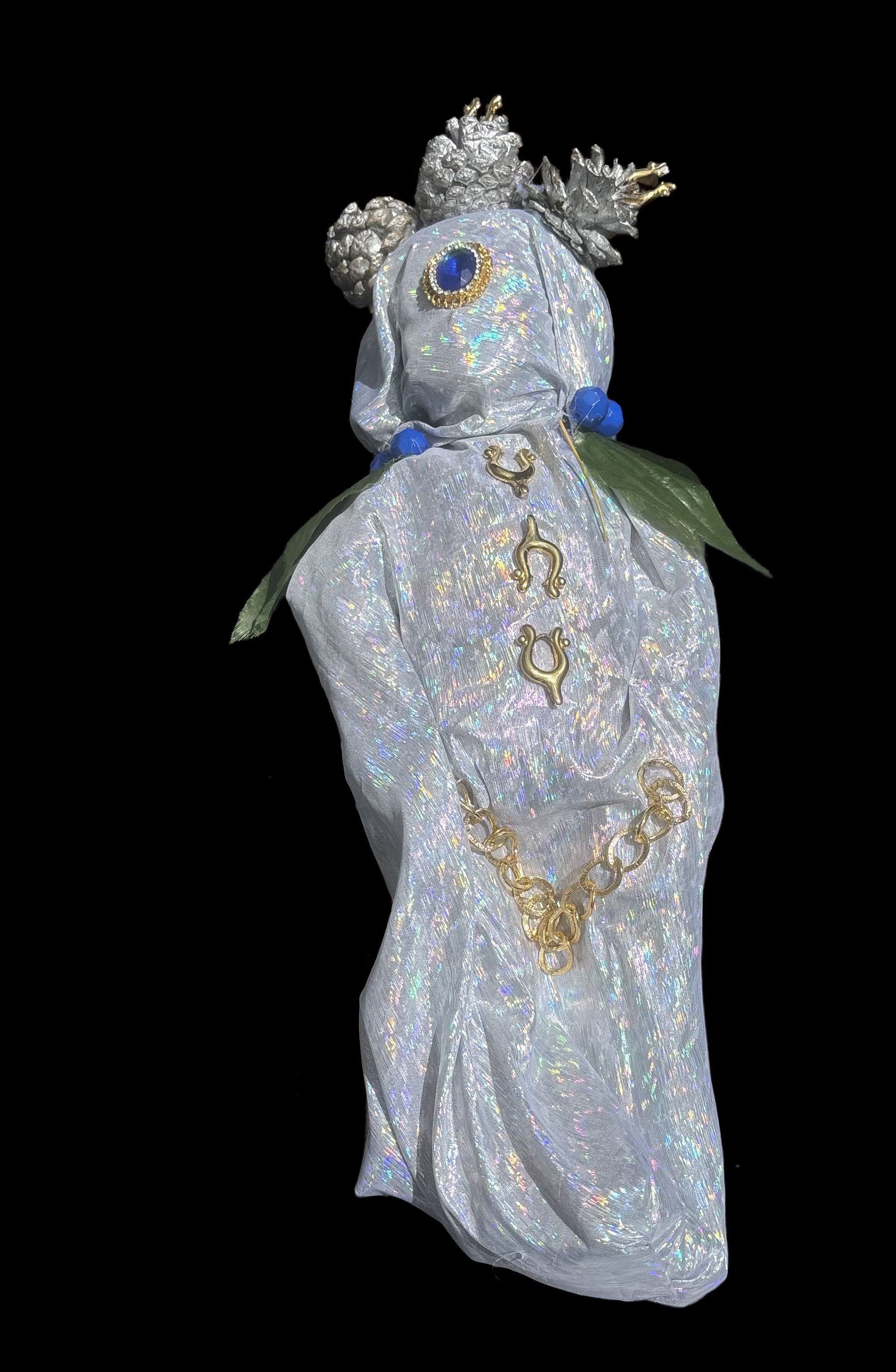  Ascension Spirit   
Soft Sculpture 
 Found Materials   
Discarded Doll, Fabric,  
Found Natural Materials,  
Costume Jewelry, Plastic Gems