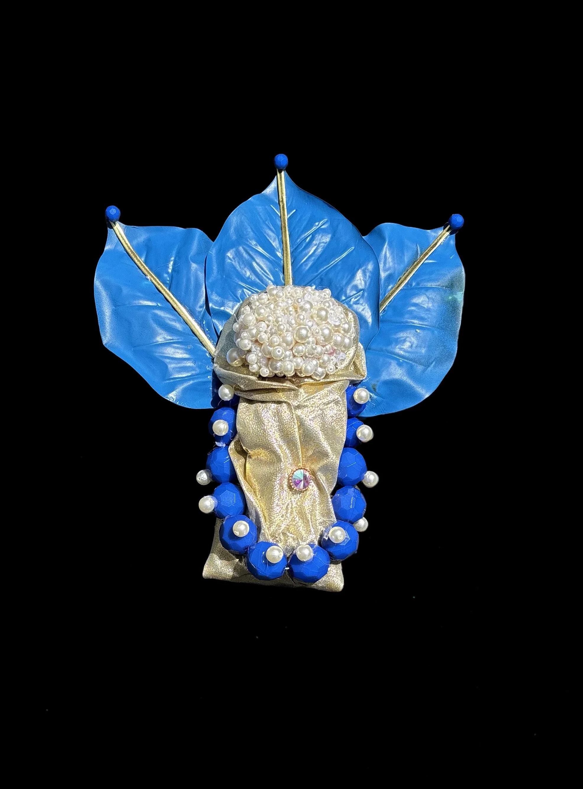  Ascension Spirit   
Soft Sculpture 
 Found Materials   
Discarded Doll, Fabric,  
Found Natural Materials,  
Costume Jewelry, Plastic Gems