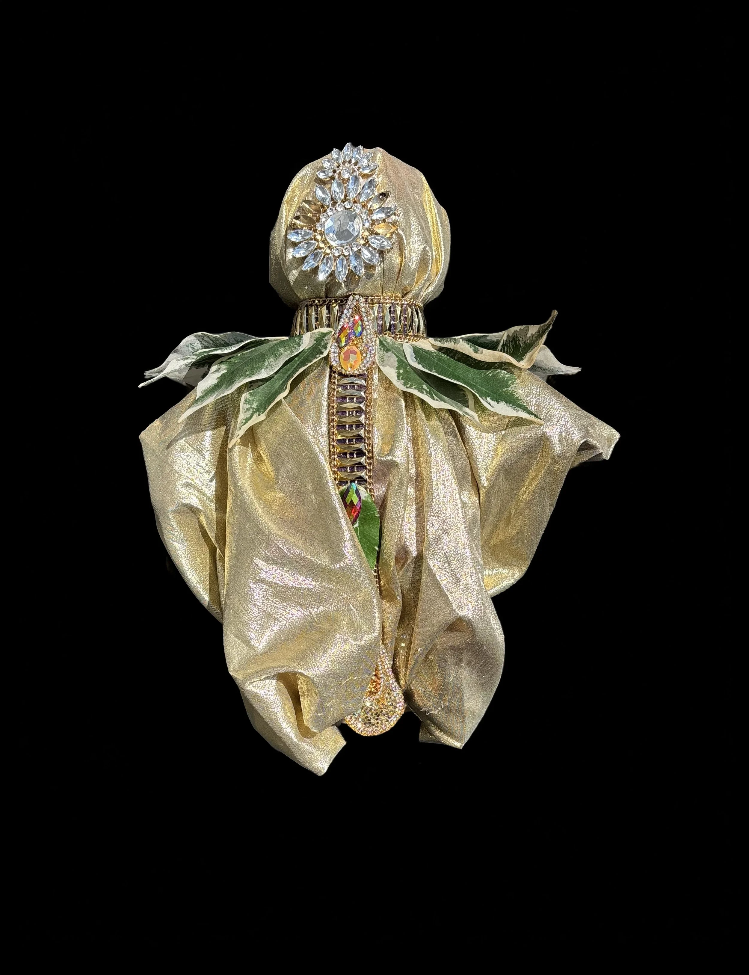  Ascension Spirit   
Soft Sculpture 
 Found Materials   
Discarded Doll, Fabric,  
Found Natural Materials,  
Costume Jewelry, Plastic Gems