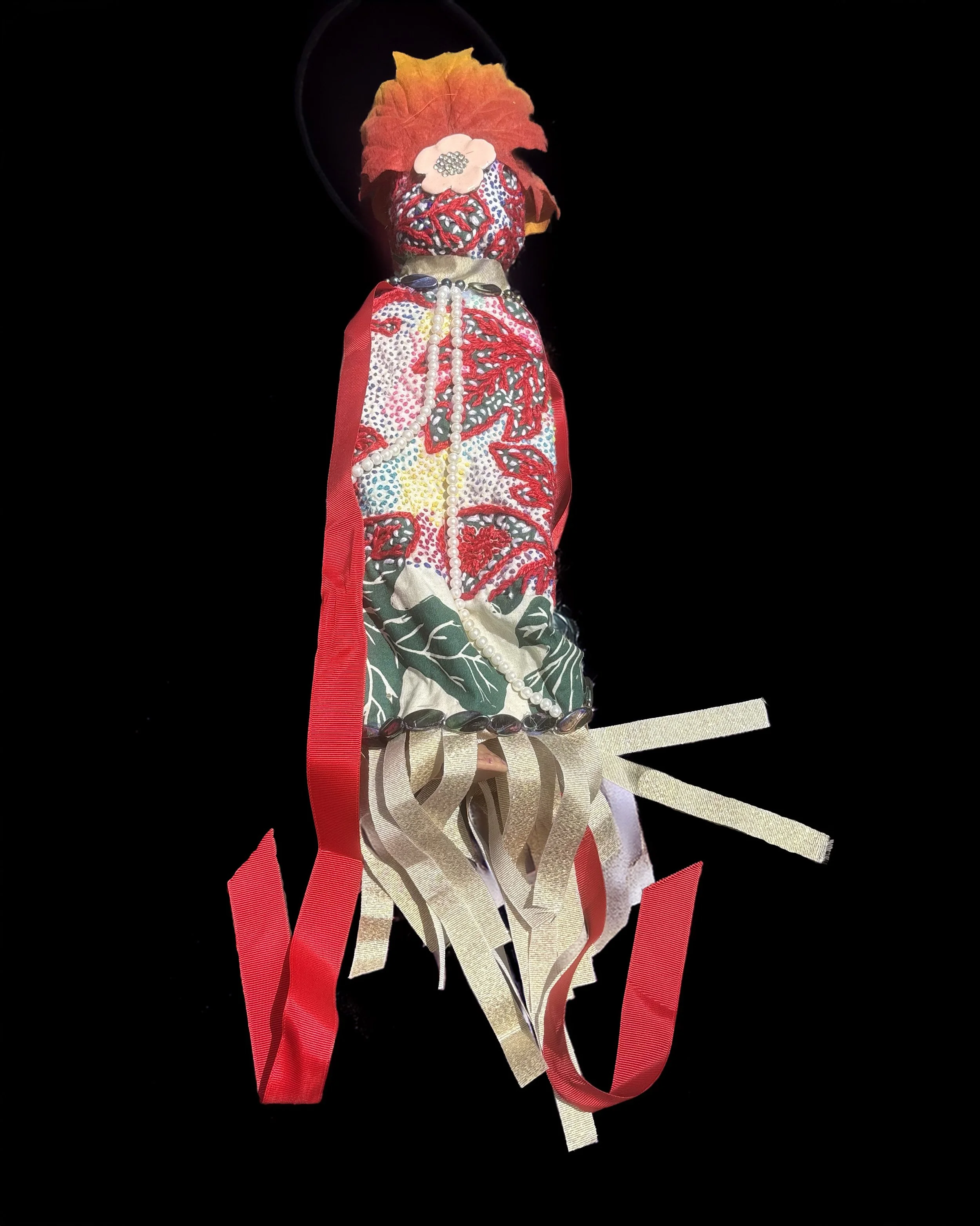  Ascension Spirit   
Soft Sculpture 
 Found Materials   
Discarded Doll, Fabric,  
Found Natural Materials,  
Costume Jewelry, Plastic Gems