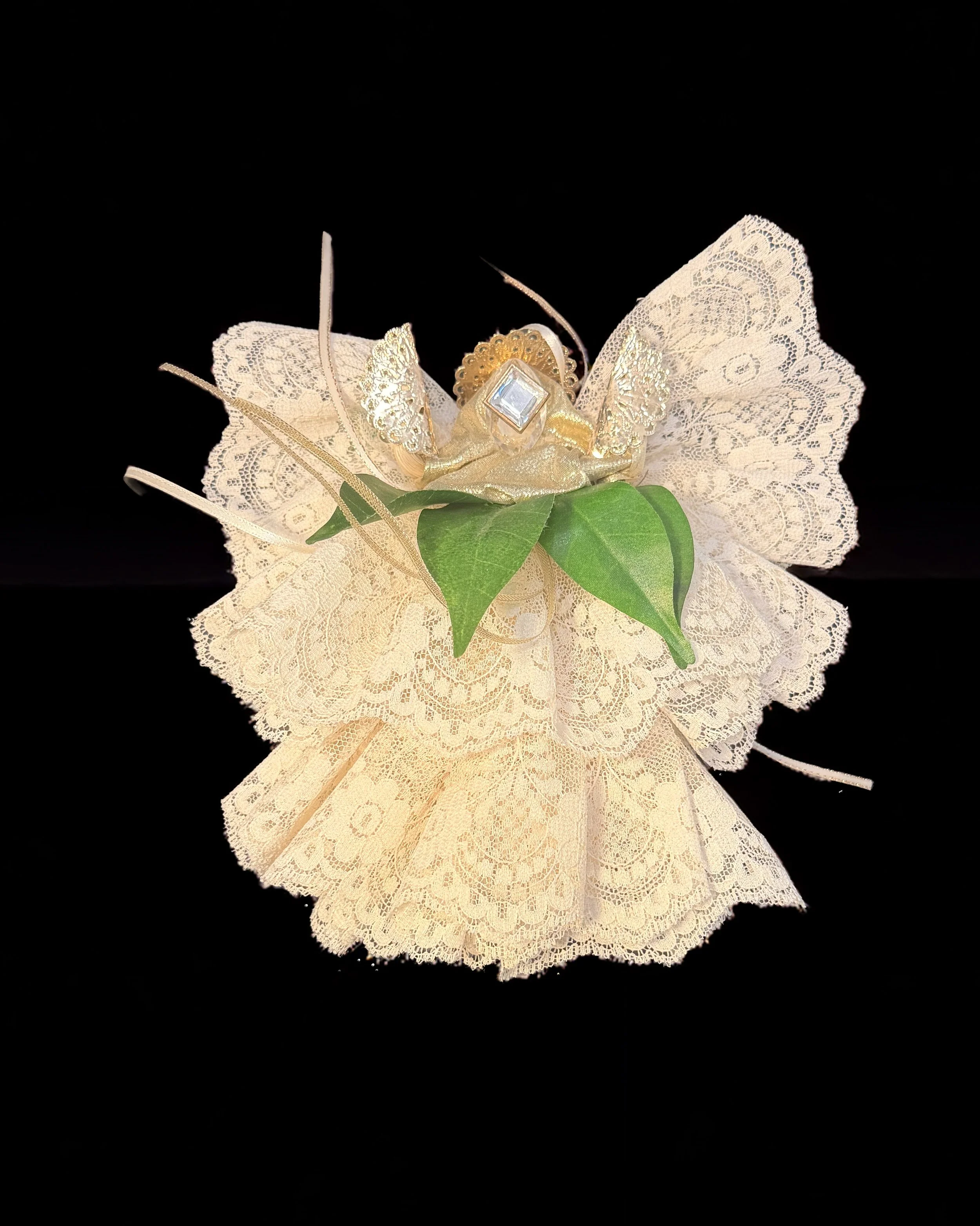  Ascension Spirit   
Soft Sculpture 
 Found Materials   
Discarded Doll, Fabric,  
Found Natural Materials,  
Costume Jewelry, Plastic Gems