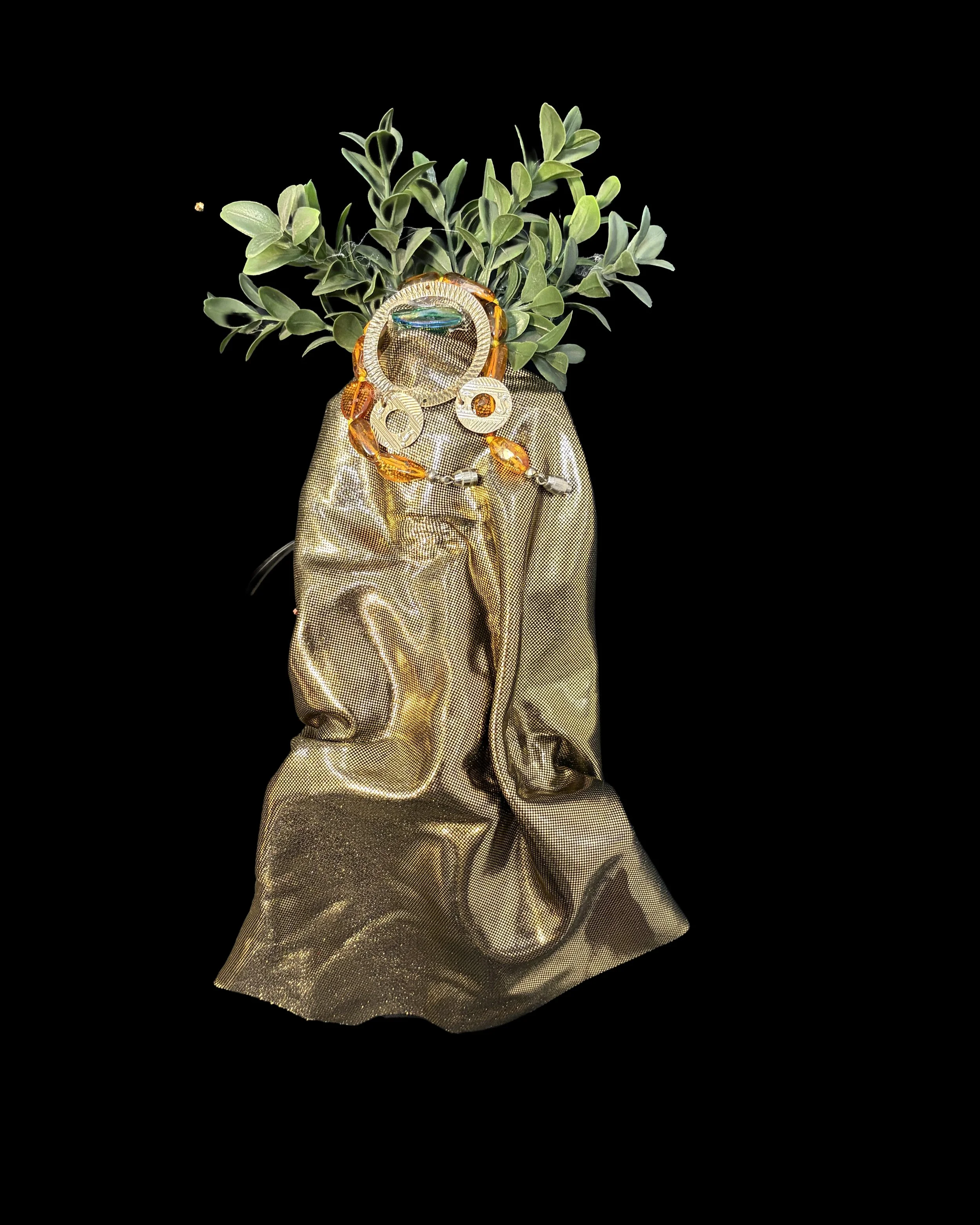  Ascension Spirit   
Soft Sculpture 
 Found Materials   
Discarded Doll, Fabric,  
Found Natural Materials,  
Costume Jewelry, Plastic Gems