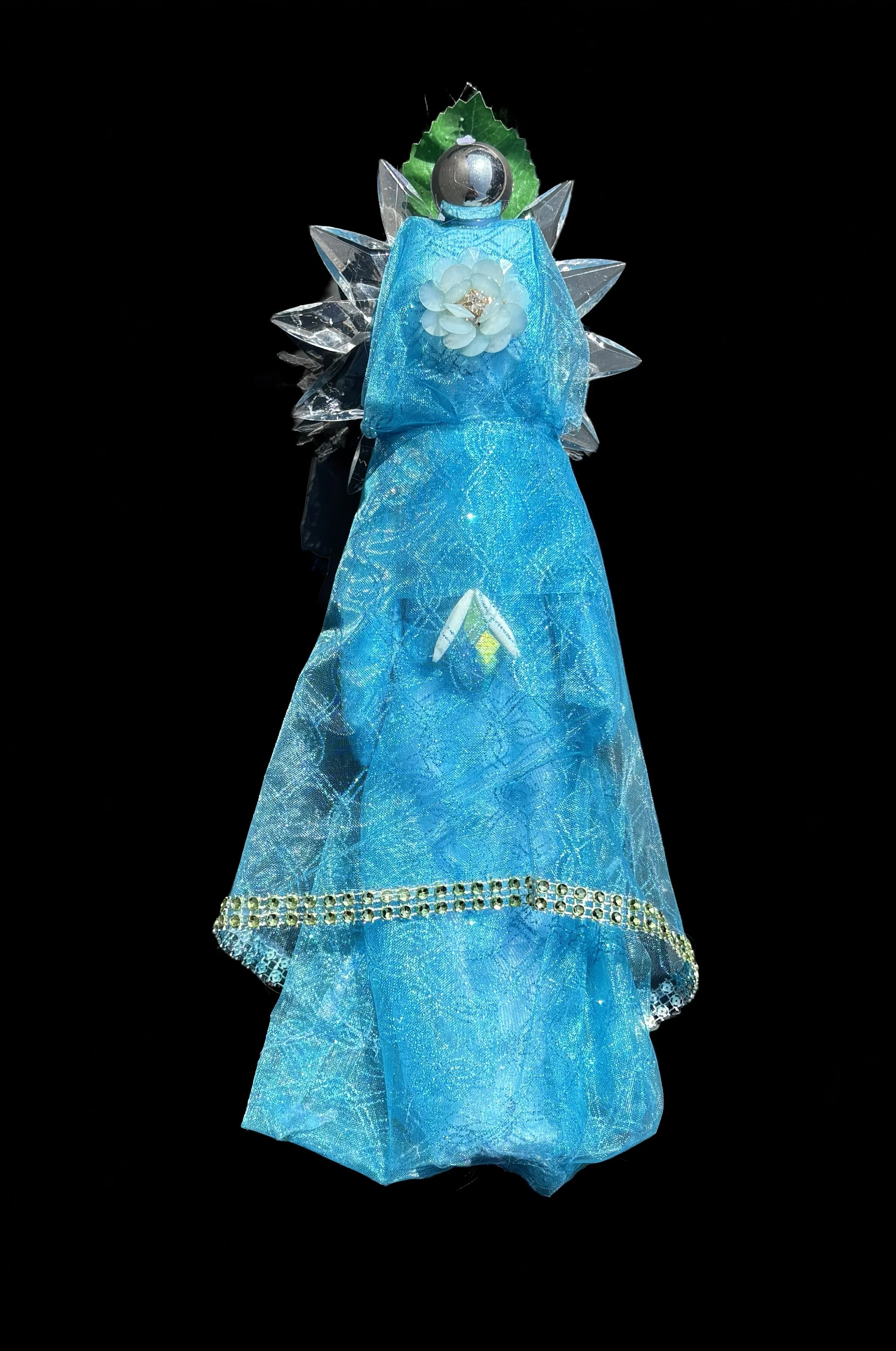 Ascension Spirit   
Soft Sculpture 
 Found Materials   
Discarded Doll, Fabric,  
Found Natural Materials,  
Costume Jewelry, Plastic Gems