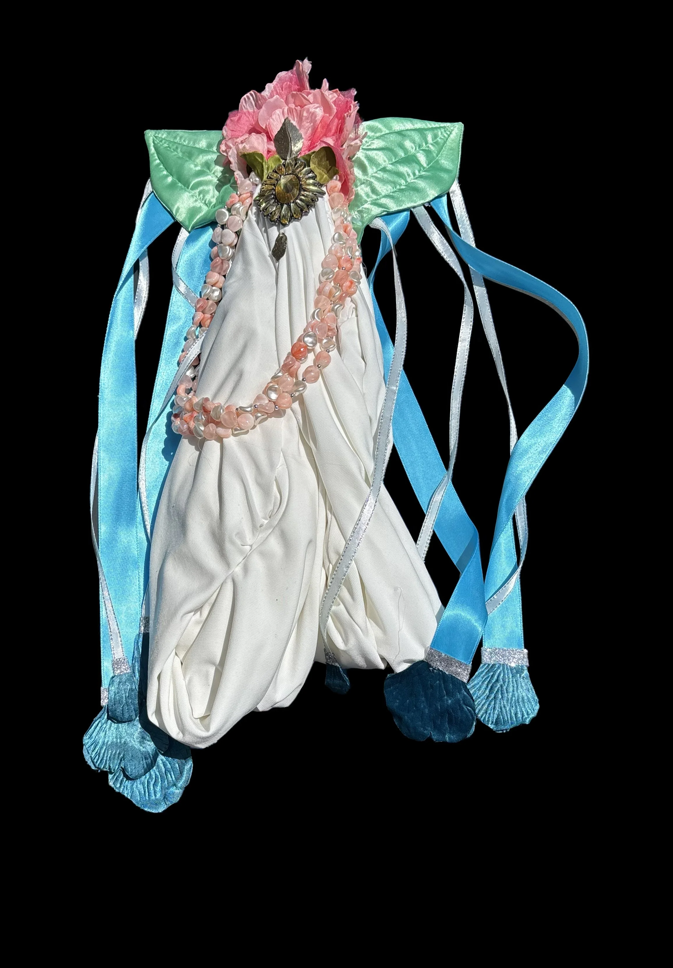  Ascension Spirit   
Soft Sculpture 
 Found Materials   
Discarded Doll, Fabric,  
Found Natural Materials,  
Costume Jewelry, Plastic Gems