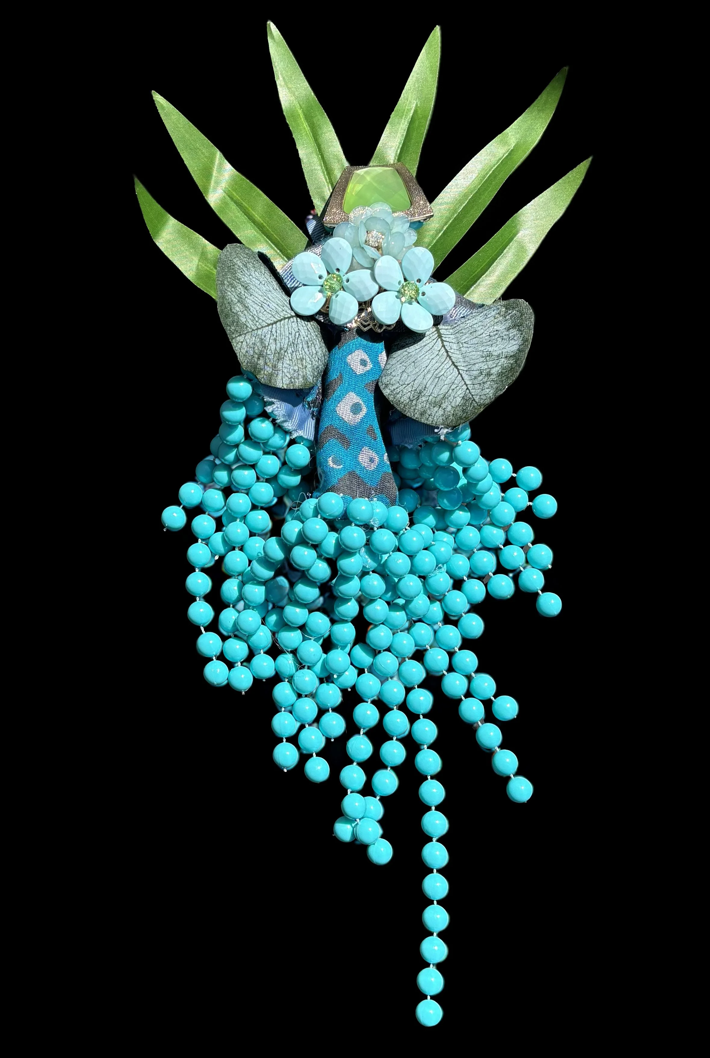  Ascension Spirit   
Soft Sculpture 
 Found Materials   
Discarded Doll, Fabric,  
Found Natural Materials,  
Costume Jewelry, Plastic Gems