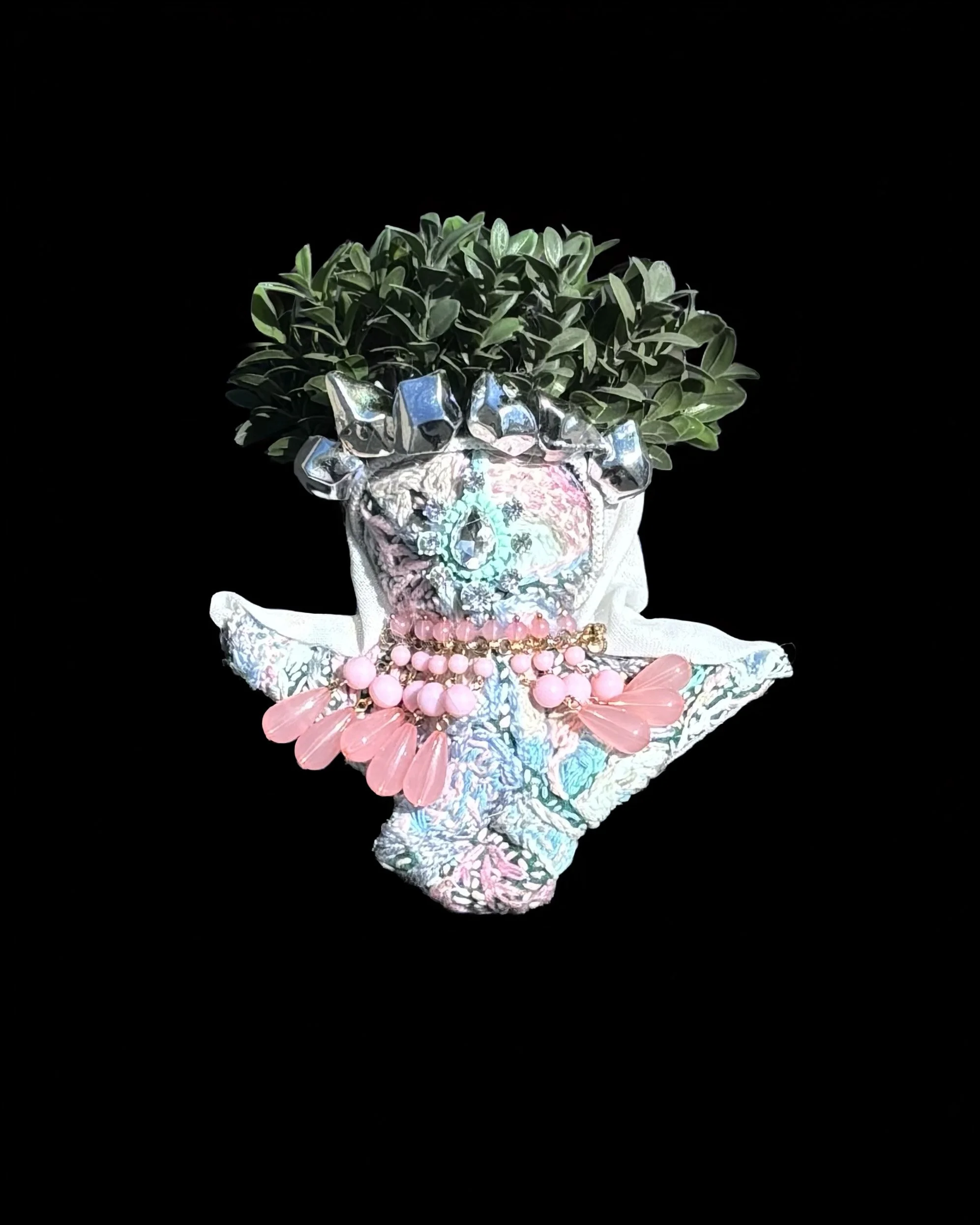  Ascension Spirit   
Soft Sculpture 
 Found Materials   
Discarded Doll, Fabric,  
Found Natural Materials,  
Costume Jewelry, Plastic Gems