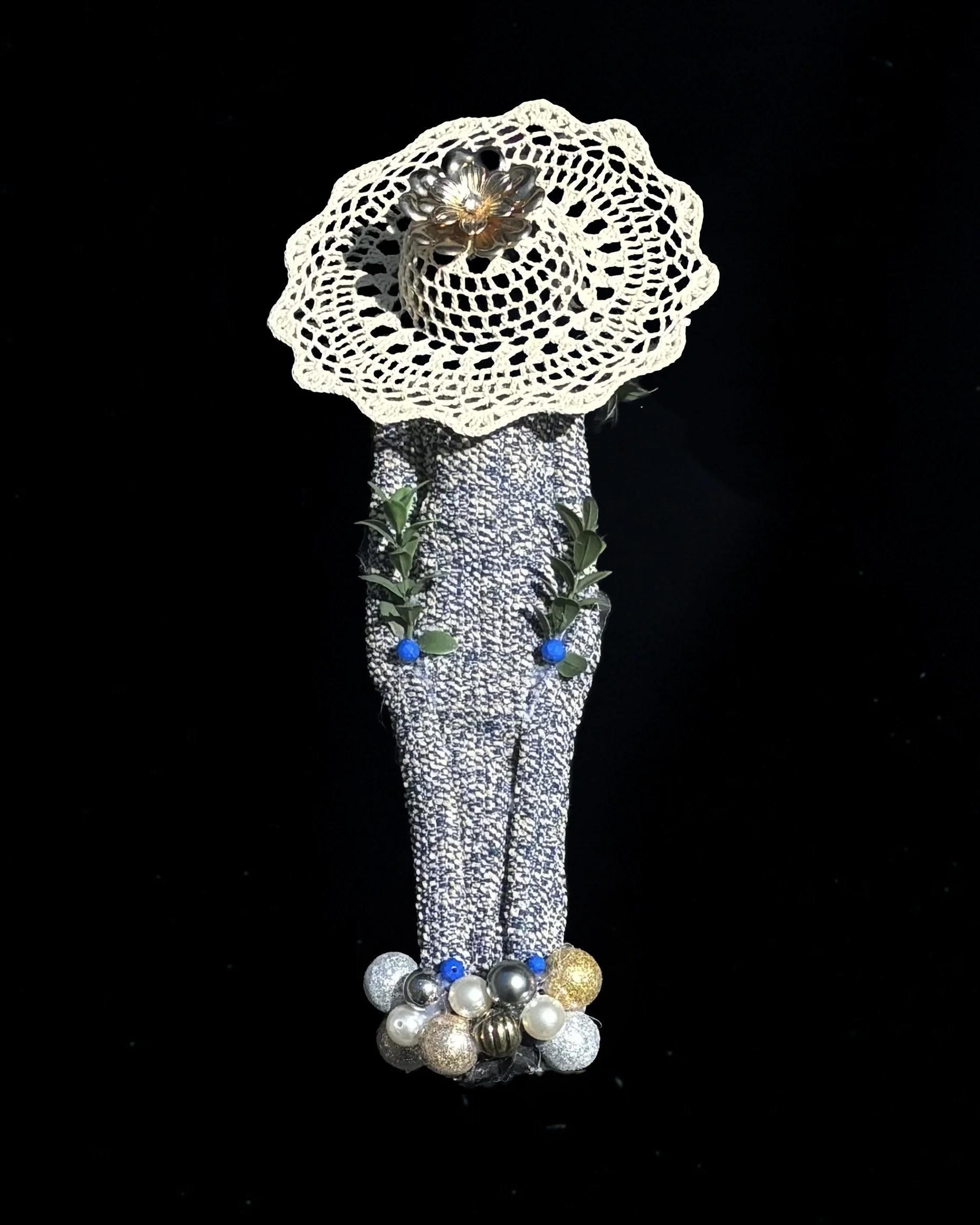  Ascension Spirit   
Soft Sculpture 
 Found Materials   
Discarded Doll, Fabric,  
Found Natural Materials,  
Costume Jewelry, Plastic Gems