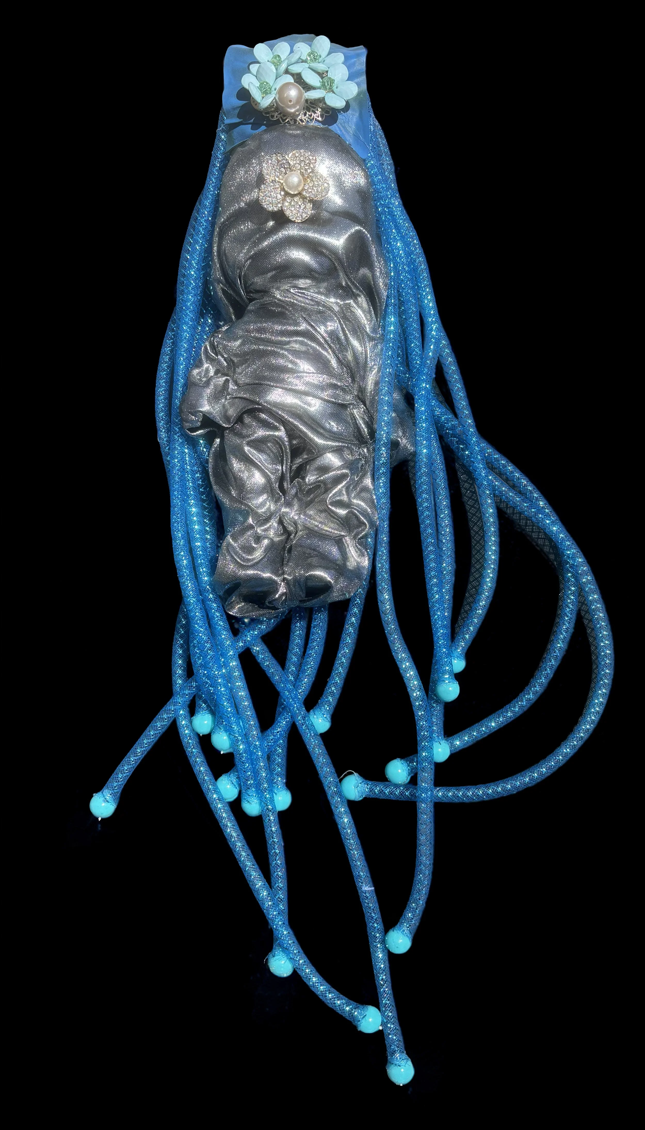  Ascension Spirit   
Soft Sculpture 
 Found Materials   
Discarded Doll, Fabric,  
Found Natural Materials,  
Costume Jewelry, Plastic Gems