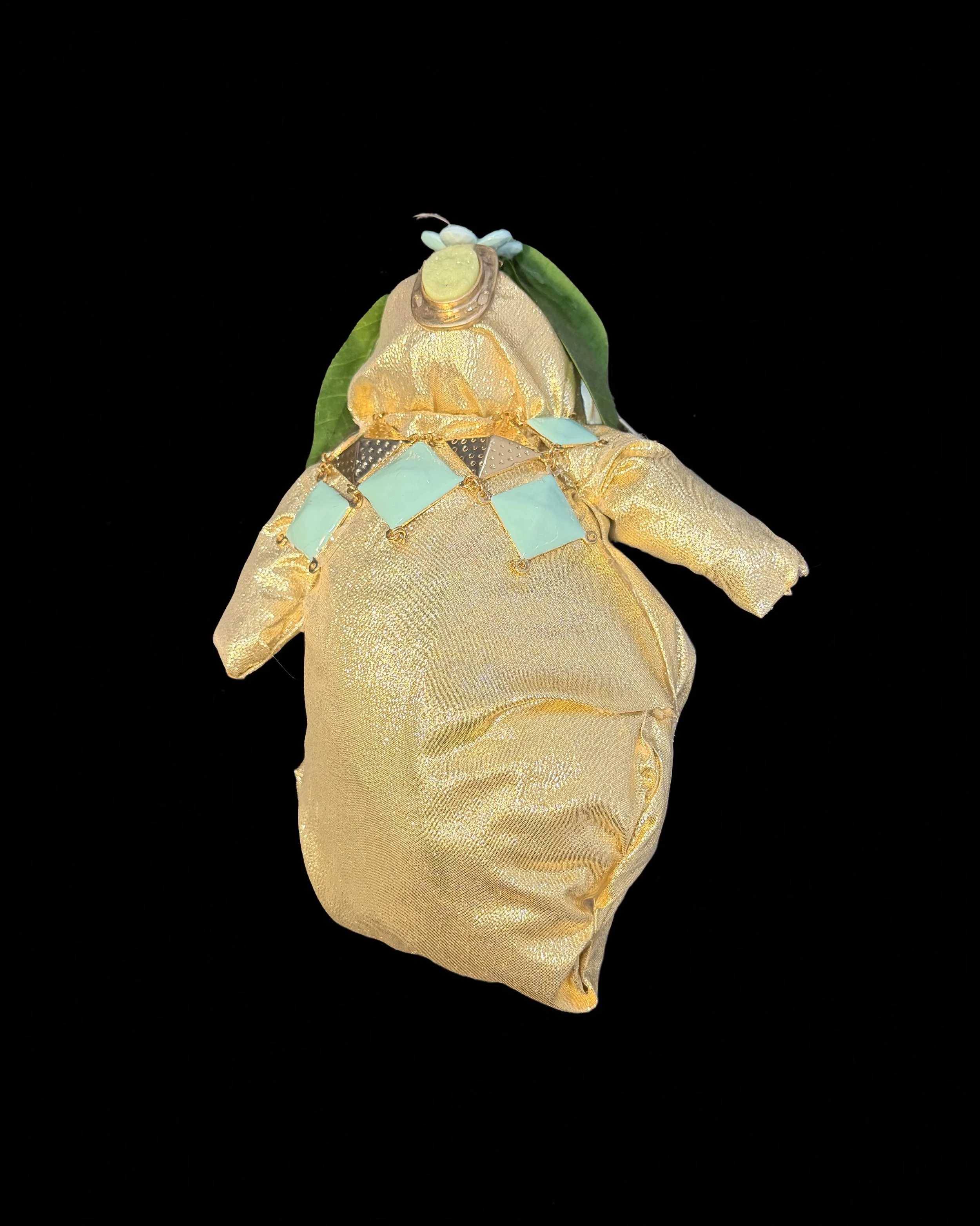  Ascension Spirit   
Soft Sculpture 
 Found Materials   
Discarded Doll, Fabric,  
Found Natural Materials,  
Costume Jewelry, Plastic Gems