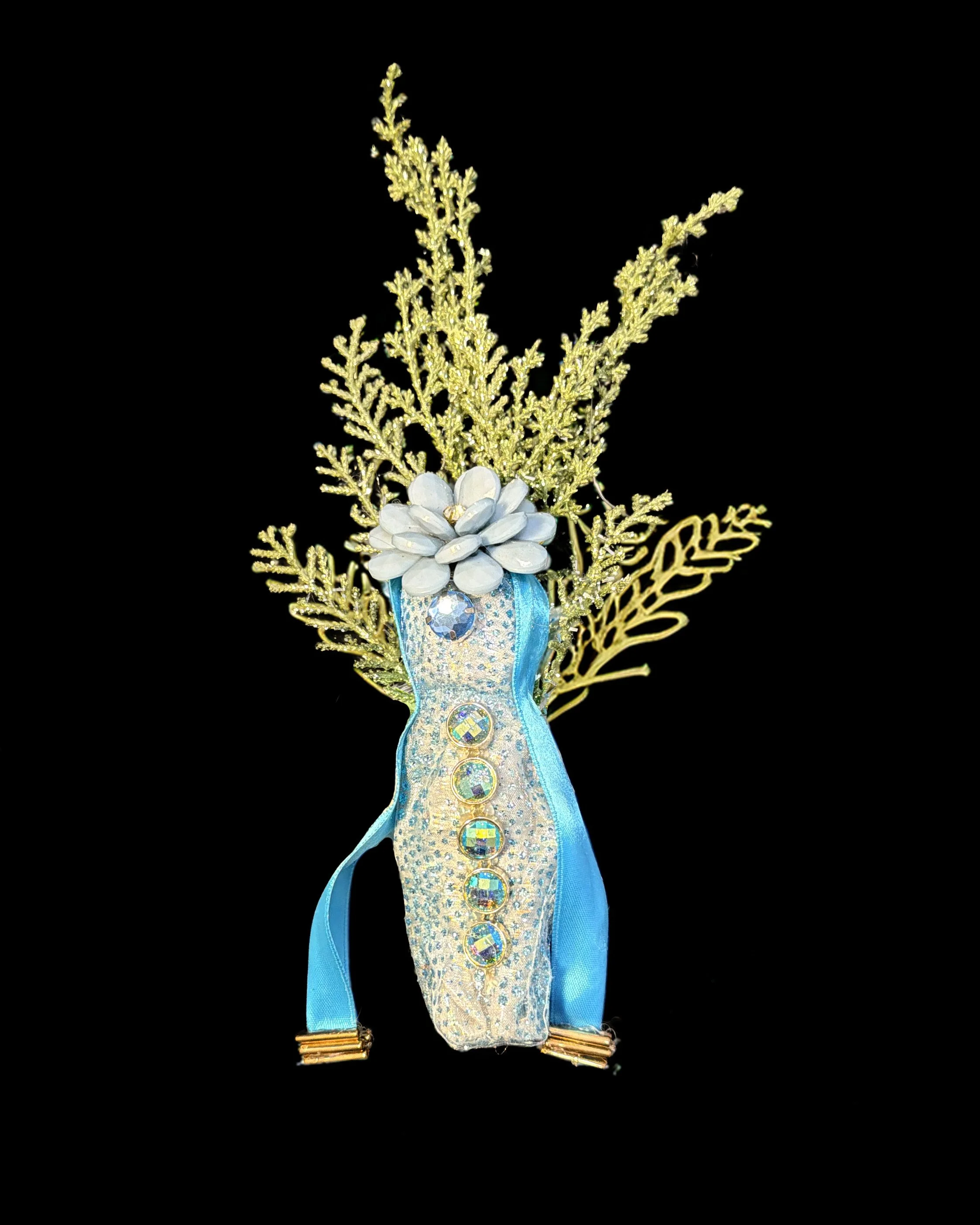  Ascension Spirit   
Soft Sculpture 
 Found Materials   
Discarded Doll, Fabric,  
Found Natural Materials,  
Costume Jewelry, Plastic Gems