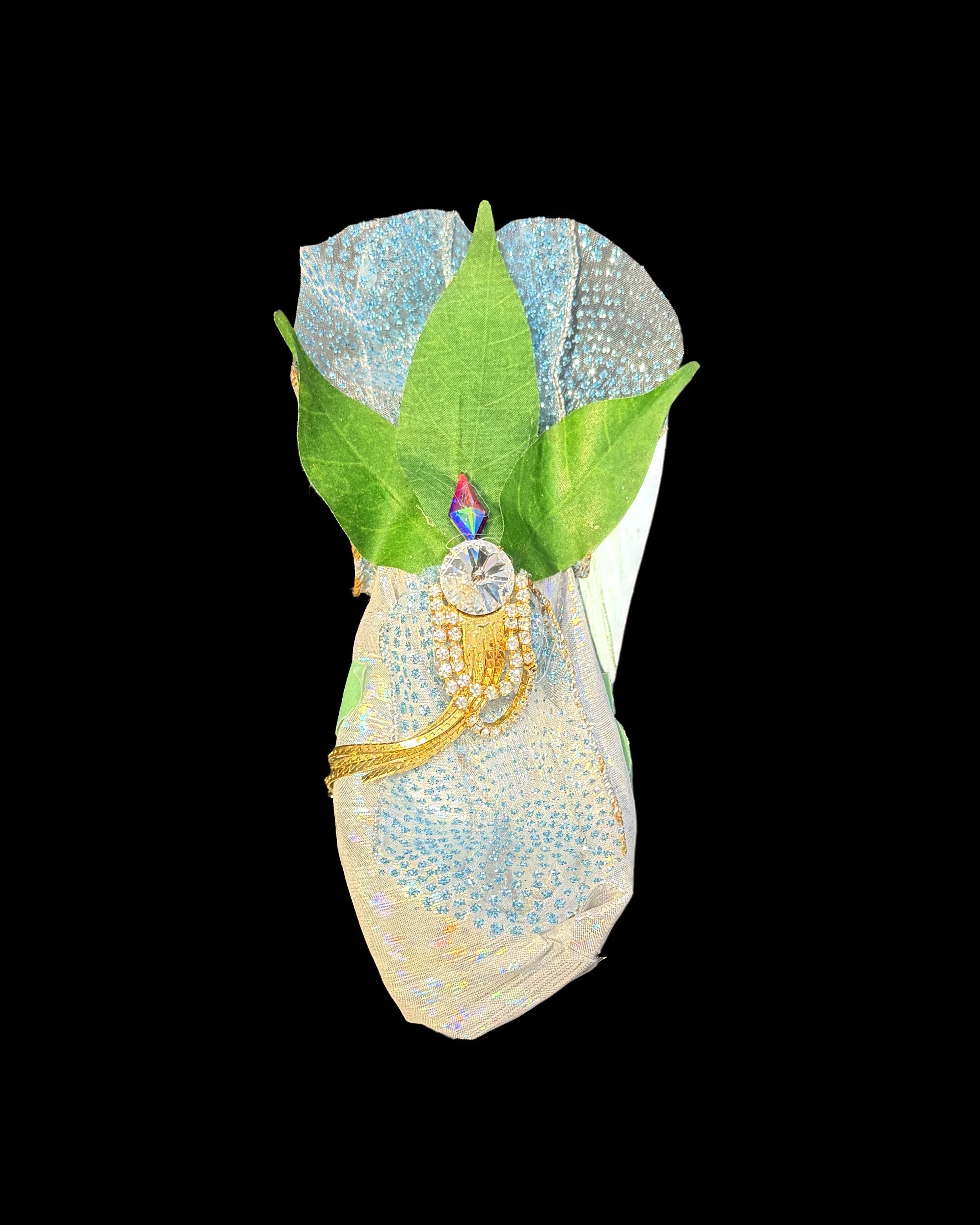  Ascension Spirit   
Soft Sculpture 
 Found Materials   
Discarded Doll, Fabric,  
Found Natural Materials,  
Costume Jewelry, Plastic Gems