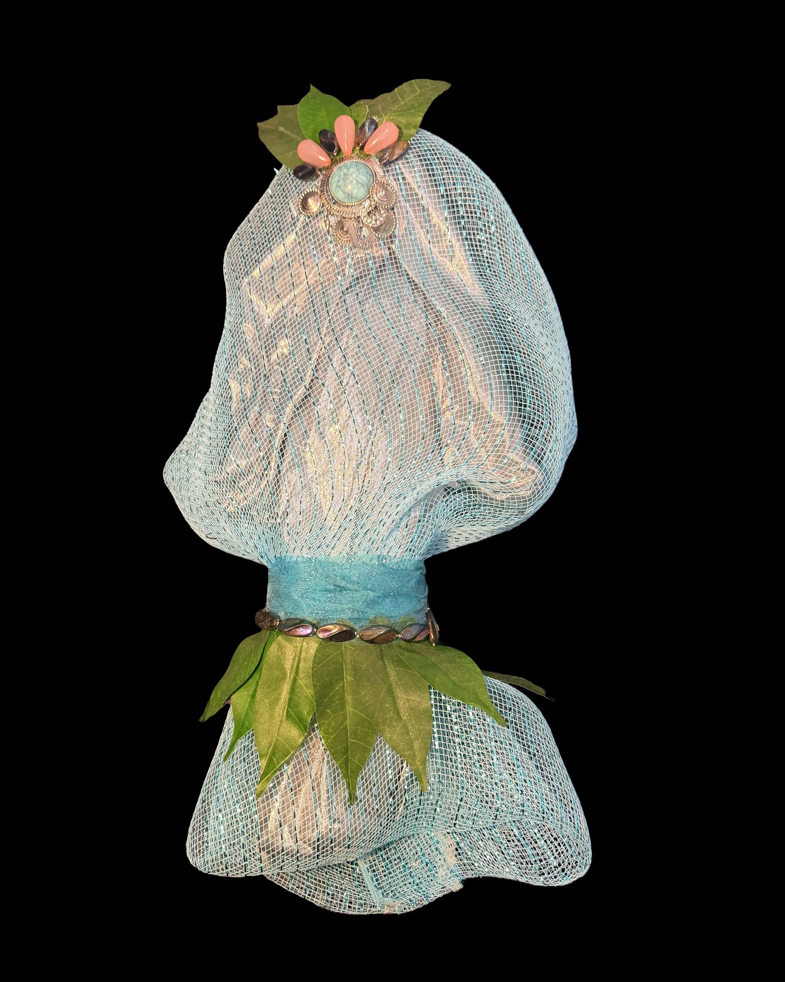  Ascension Spirit   
Soft Sculpture 
 Found Materials   
Discarded Doll, Fabric,  
Found Natural Materials,  
Costume Jewelry, Plastic Gems
