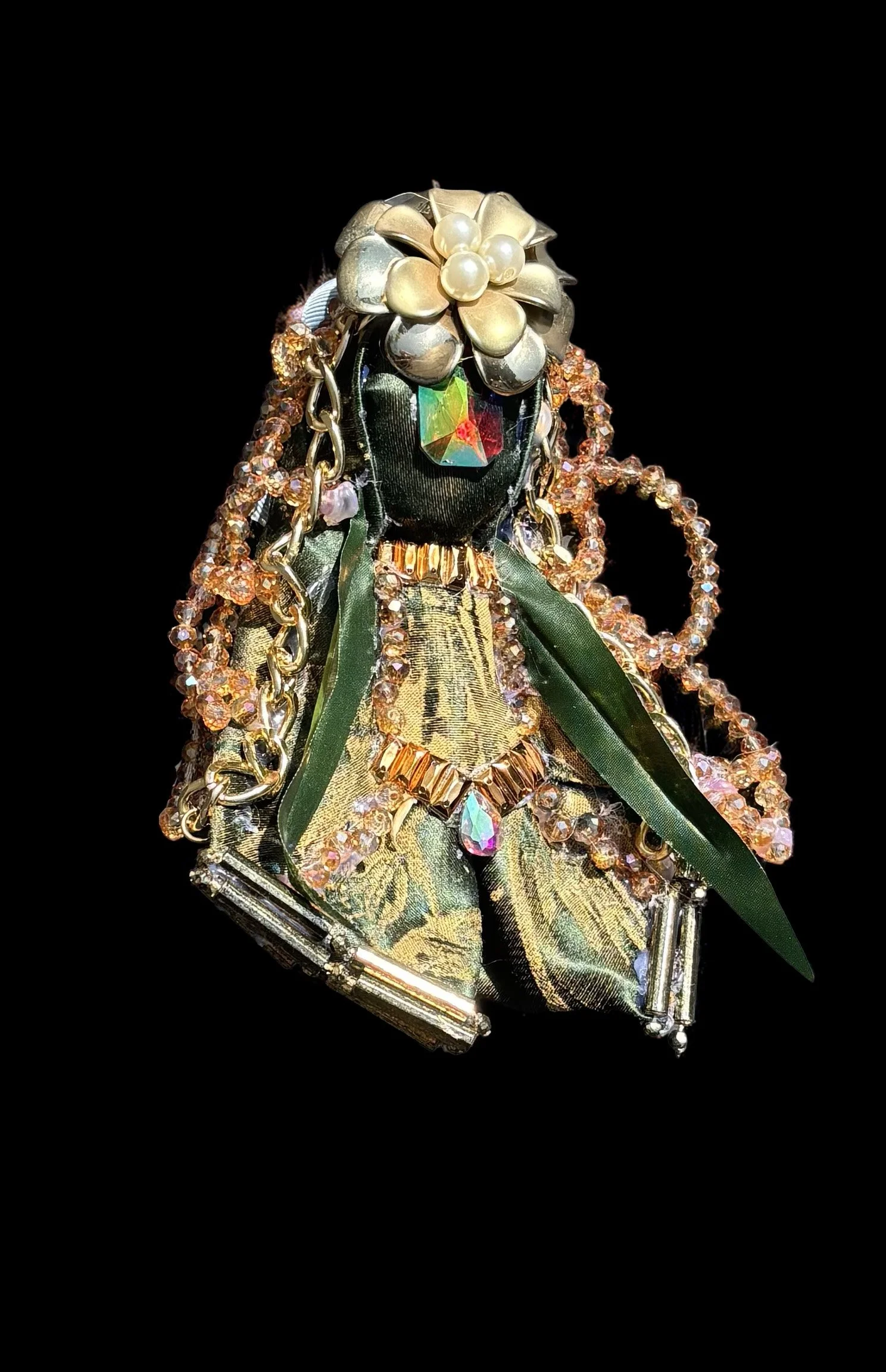  Ascension Spirit   
Soft Sculpture 
 Found Materials   
Discarded Doll, Fabric,  
Found Natural Materials,  
Costume Jewelry, Plastic Gems