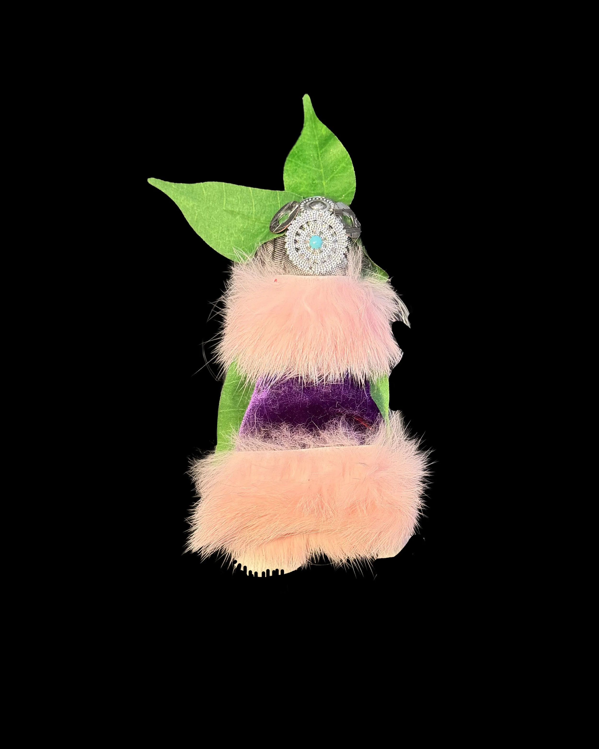  Ascension Spirit   
Soft Sculpture 
 Found Materials   
Discarded Doll, Fabric,  
Found Natural Materials,  
Costume Jewelry, Plastic Gems
