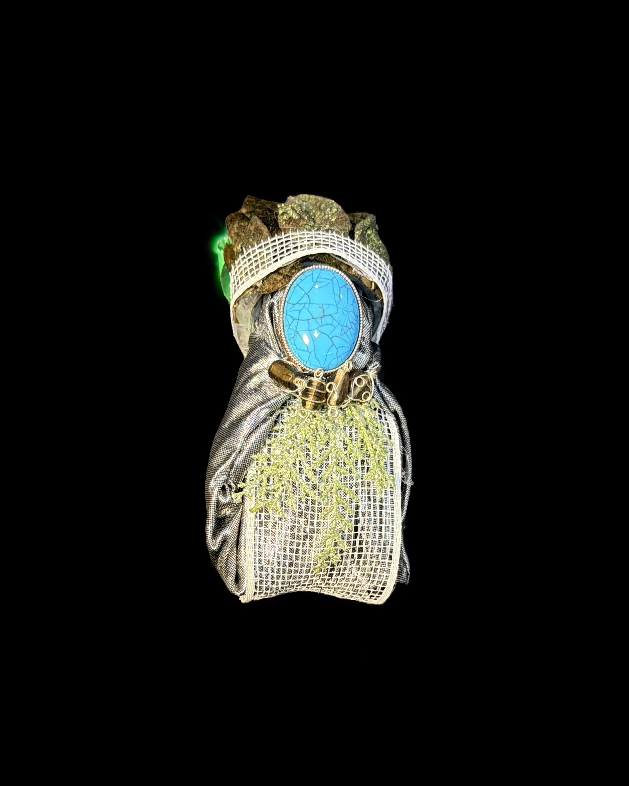  Ascension Spirit   
Soft Sculpture 
 Found Materials   
Discarded Doll, Fabric,  
Found Natural Materials,  
Costume Jewelry, Plastic Gems