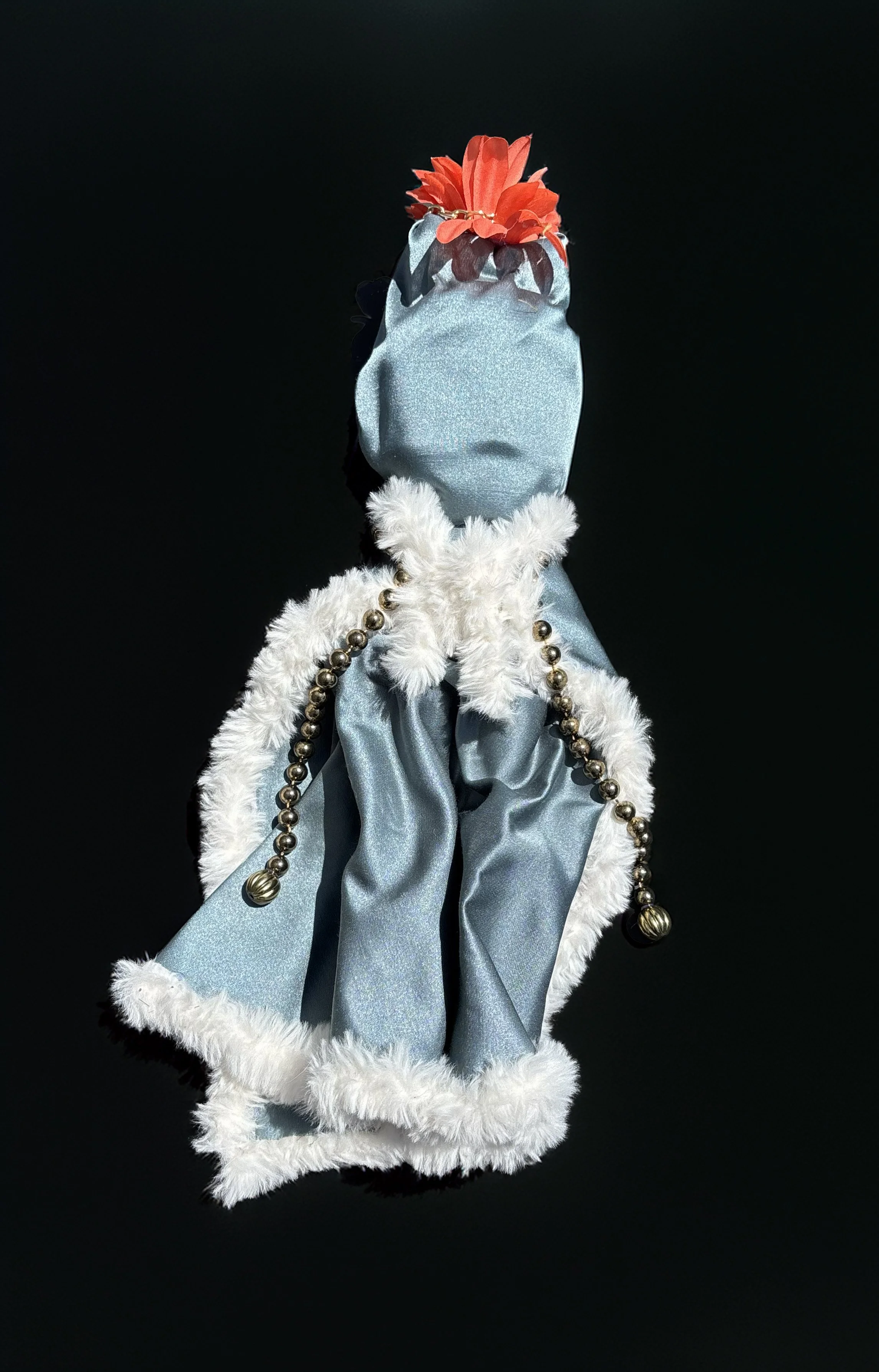  Ascension Spirit   
Soft Sculpture 
 Found Materials   
Discarded Doll, Fabric,  
Found Natural Materials,  
Costume Jewelry, Plastic Gems