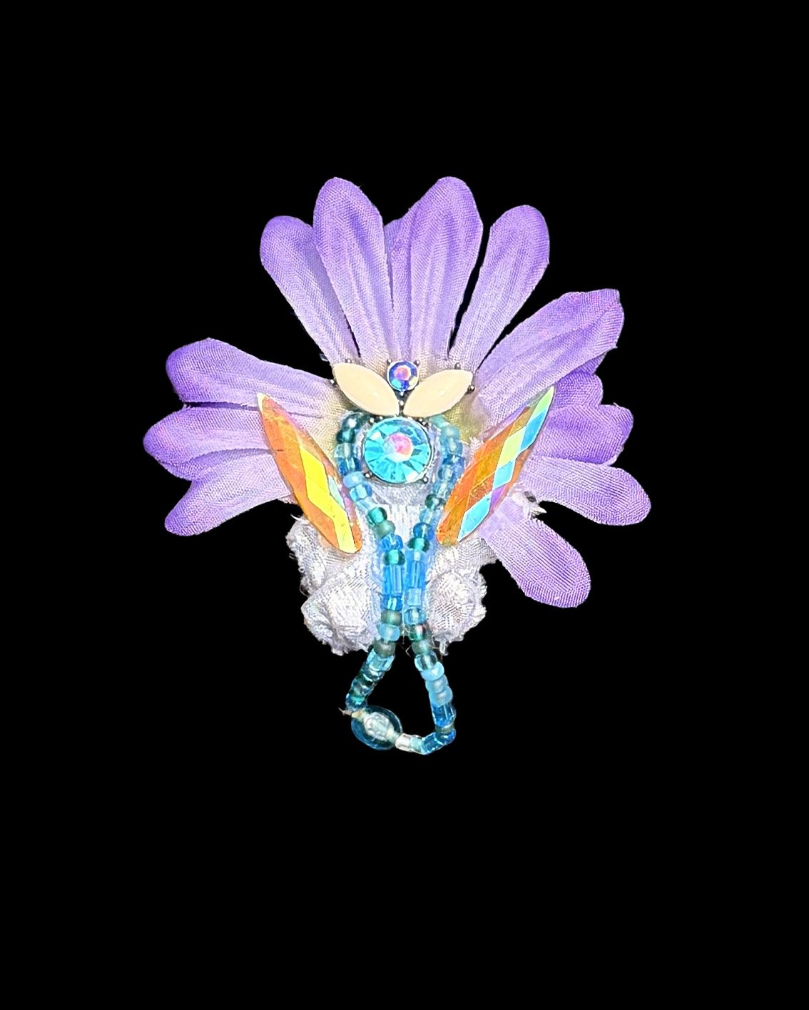  Ascension Spirit   
Soft Sculpture 
 Found Materials   
Discarded Doll, Fabric,  
Found Natural Materials,  
Costume Jewelry, Plastic Gems