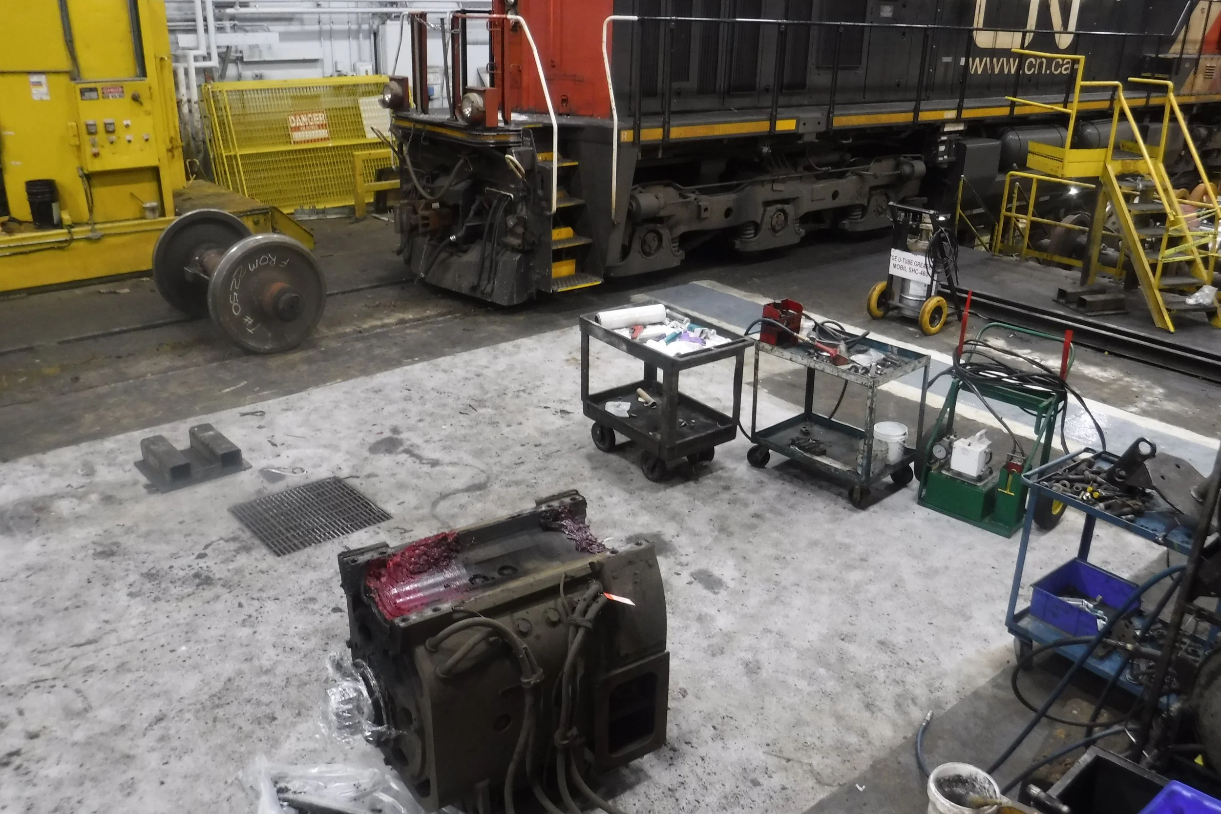 At 12 months service.  Great drainage.  Dry work area has improved and brightened the work environment tremendously, as well as supplying a floor that is much easier to clean...