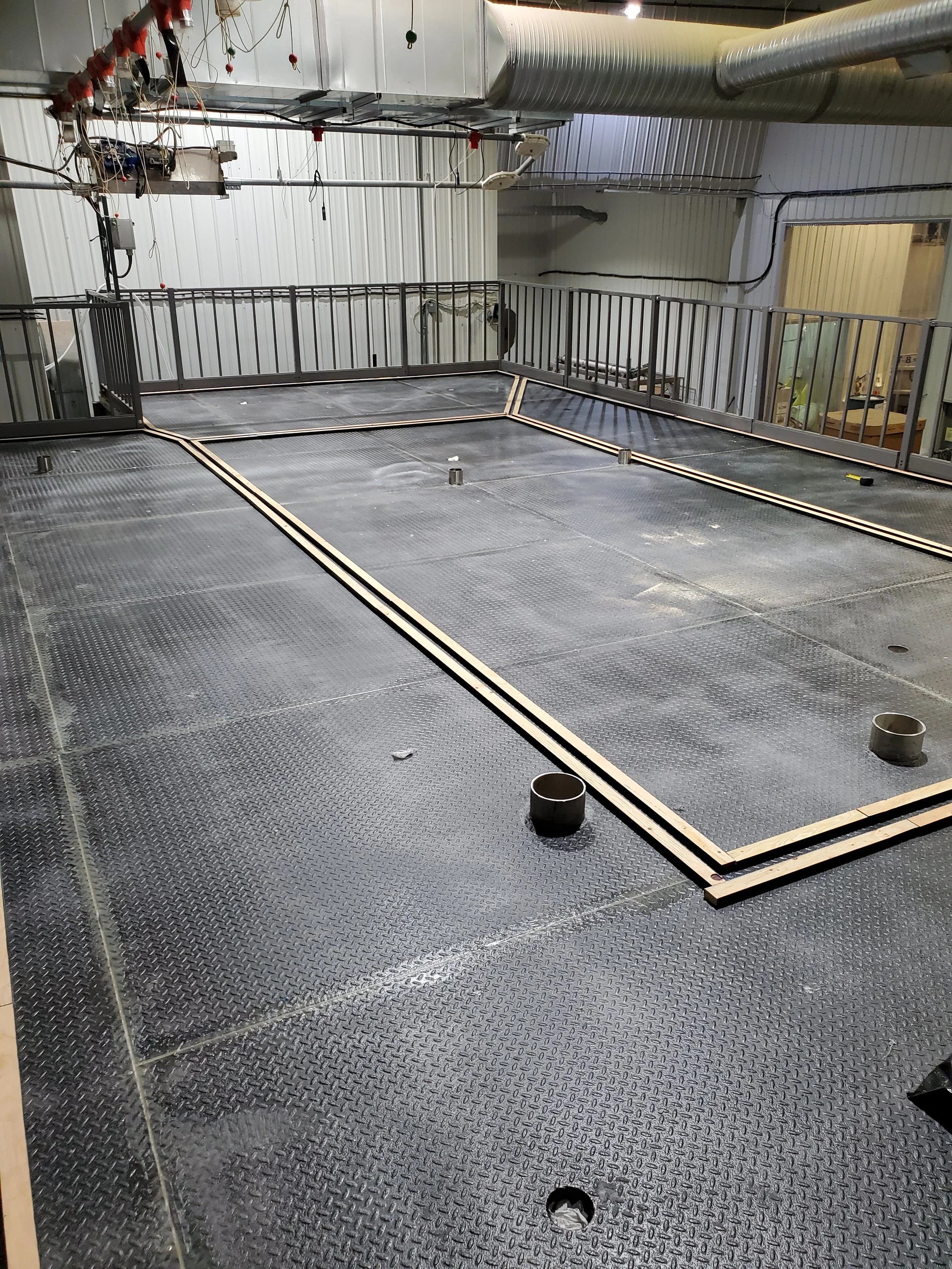 The client needed a QA / QC laboratory located inside their plant. The laboratory needed to be elevated due to space constraints, and a safe, sloped flooring system would be required.