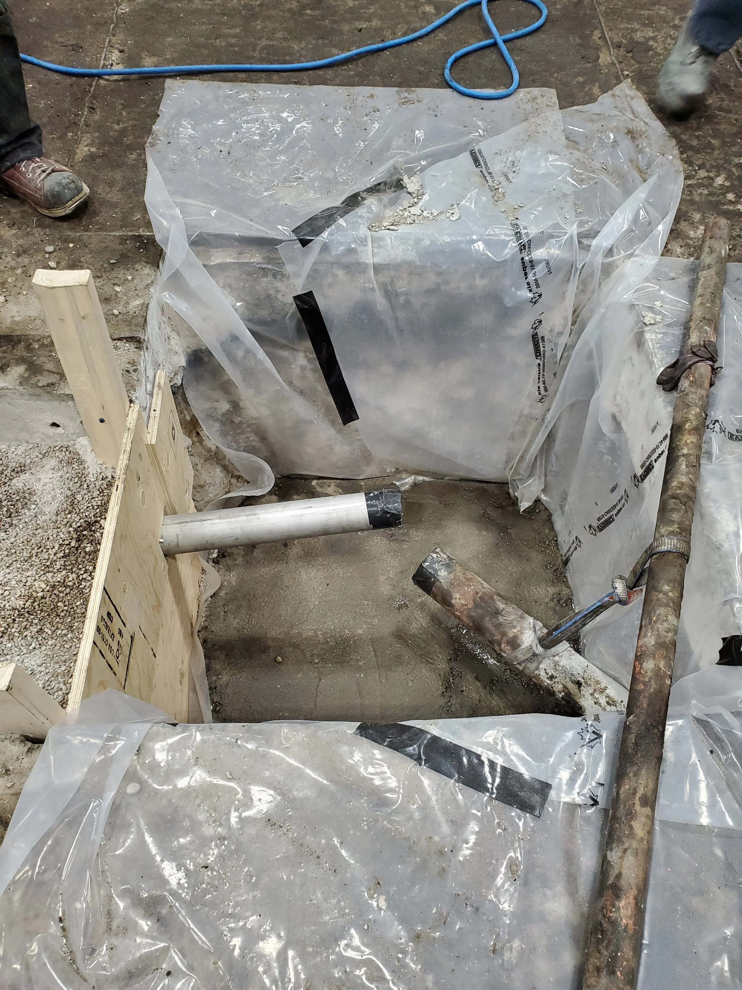 Isolation poly to keep our plastic R17 concrete resin away from sub slab soil.