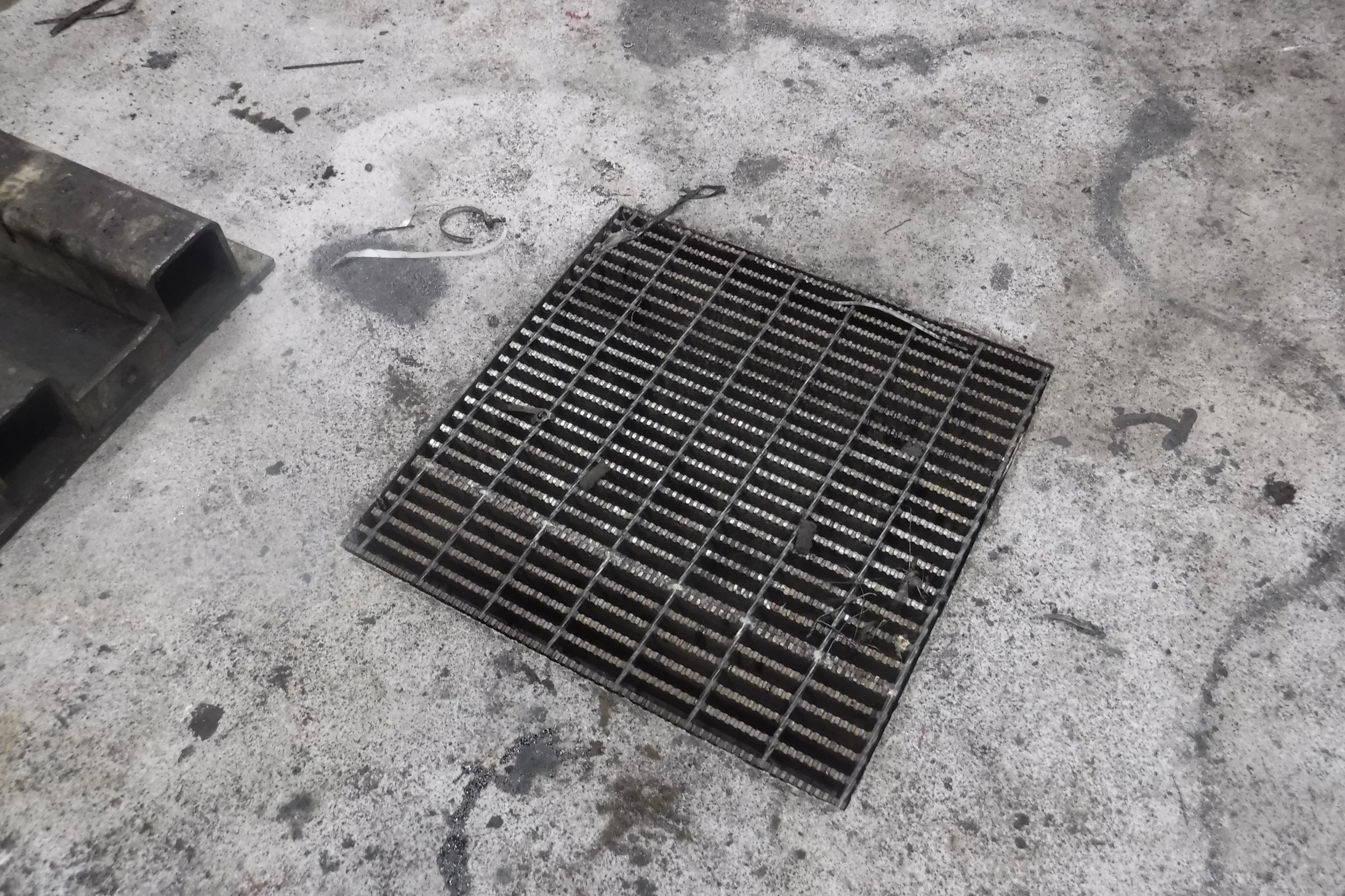 12 months service Drain area was surrounded and now hidden from sub-surface structural steel.  We were able to finesse the slope to cover over top of the unmovable steel structural, and bonding to the steel as well.  No failure after 1 year.