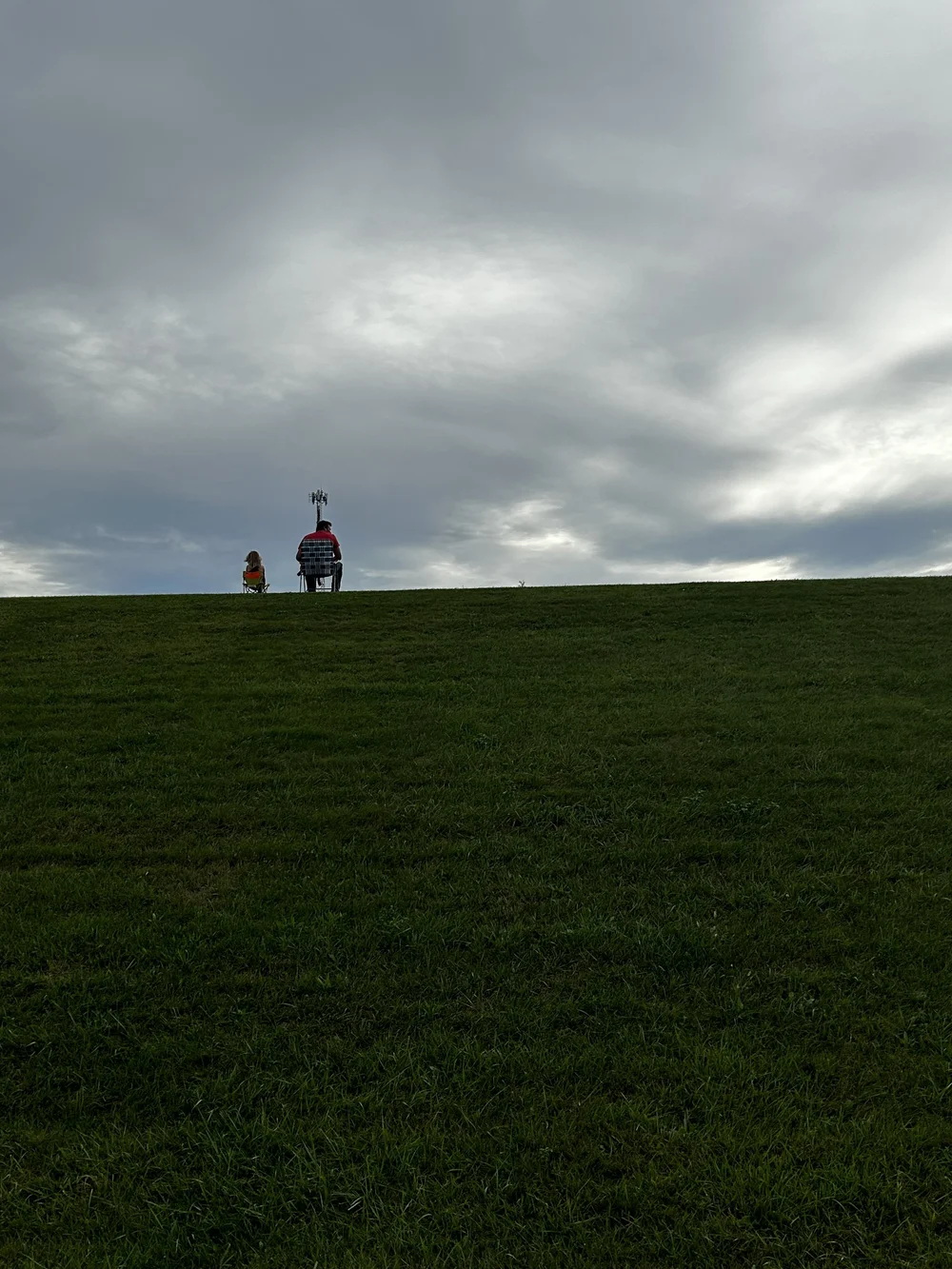 Supporters cheer on the kayakers