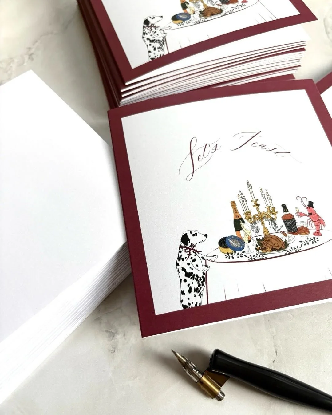 Let&rsquo;s feast. 
I&rsquo;ve always loved setting the table just as much as cooking the meal itself. The candles, the details, the little moments before everyone sits down.  My custom Christmas card came from that feeling, playful, cozy, and a remi