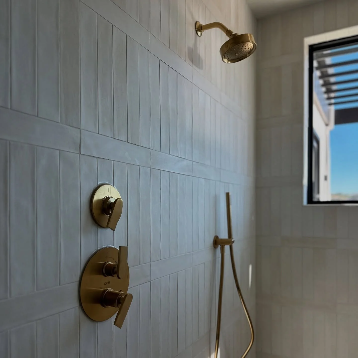 This tile layout 😎  just the perfect pop of fun to this dreamy neutral palette.