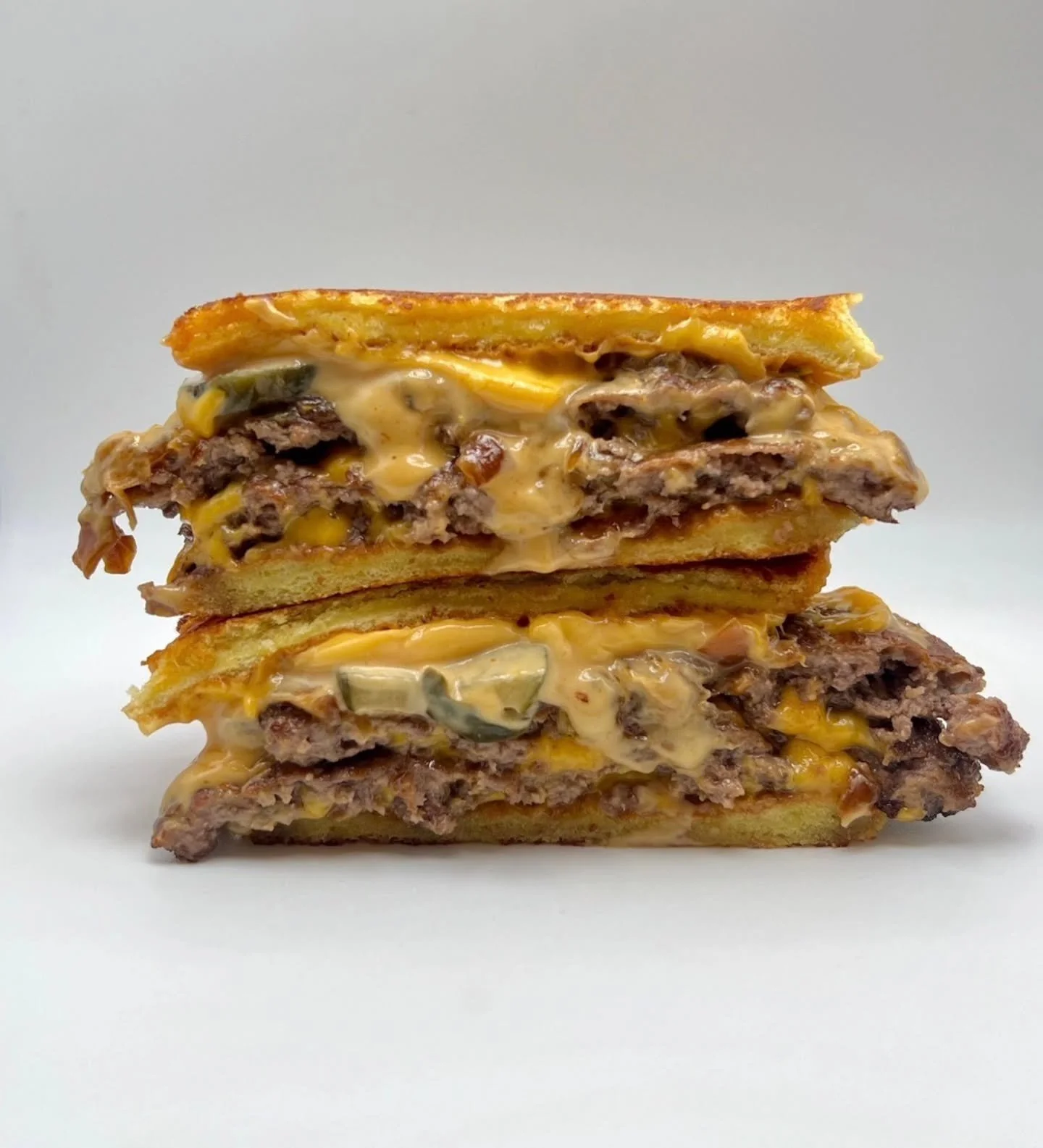 Lots of cheese, meat, sweet onion jam, and pickles. This is our Grilled Cheese Burger

Our fall specials coming soon 👀 

Stay tuned 😉