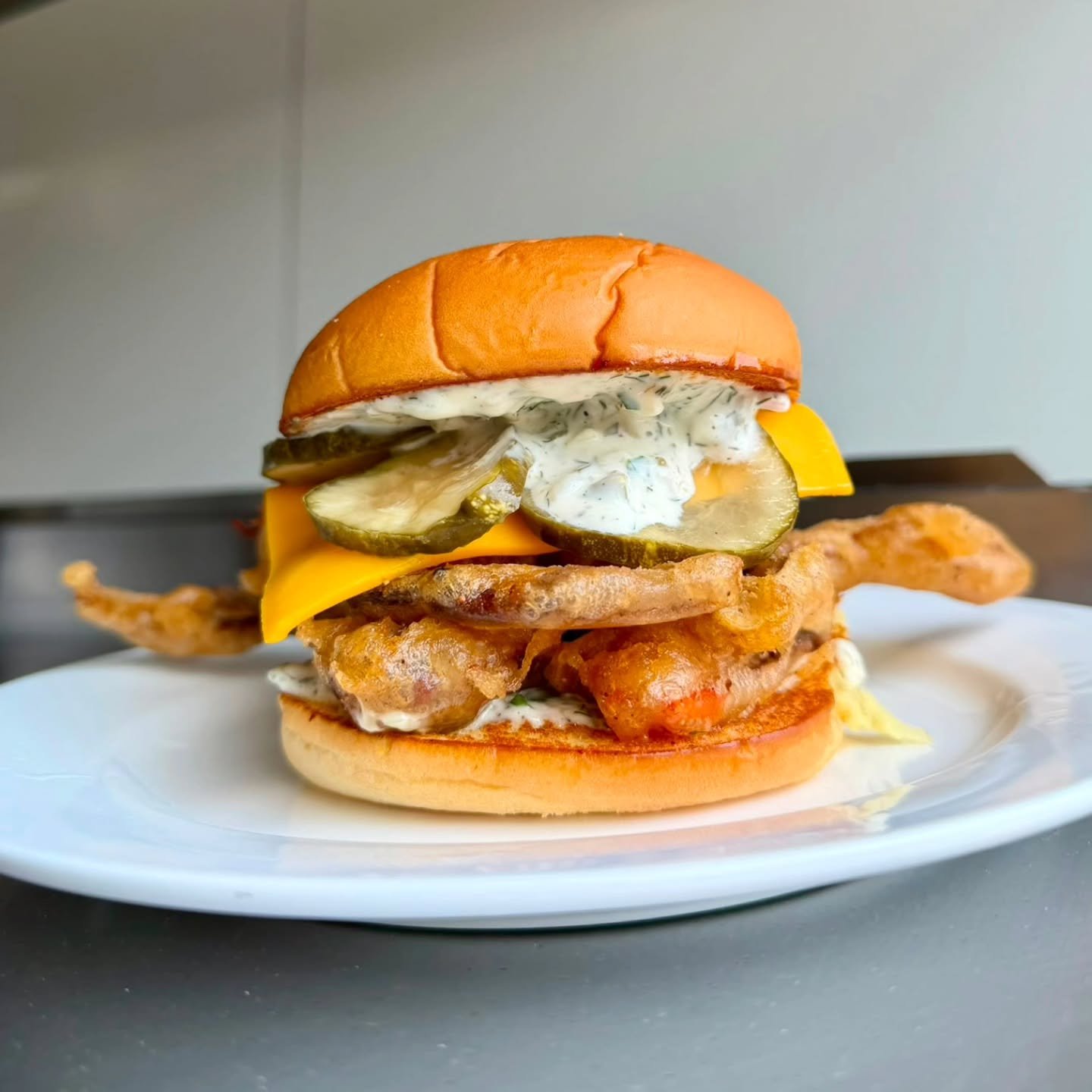 SOFTSHELL CRAB SANDWICH 🦀

Tempura batter softshell crab, tartar sauce, nashville seasoning, american cheese, and sweet pickles on a toasted potato bun 

ONLY available on Fridays at our St. Clair location! Very limited quantity.