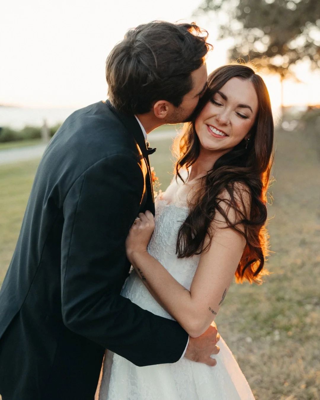 Del + Blake at golden hour 🥂

Right before the reception, we snuck away for a few quiet minutes and the light showed up in the best way. Easy, happy, and completely them &mdash; nothing forced, just soaking it in together.

St. Simons sunsets never 