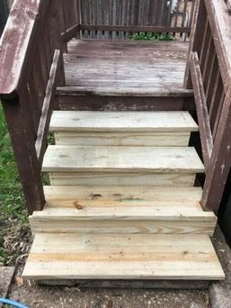 During repair — old porch stair treads being replaced — Porch Stair Tread Replacement