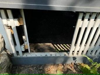 Before — porch railing requiring baluster repair — White Porch Baluster Repair