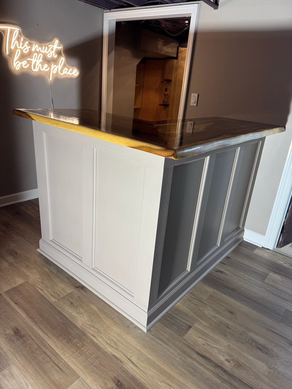 Side view of the finished bar and its paneled base.