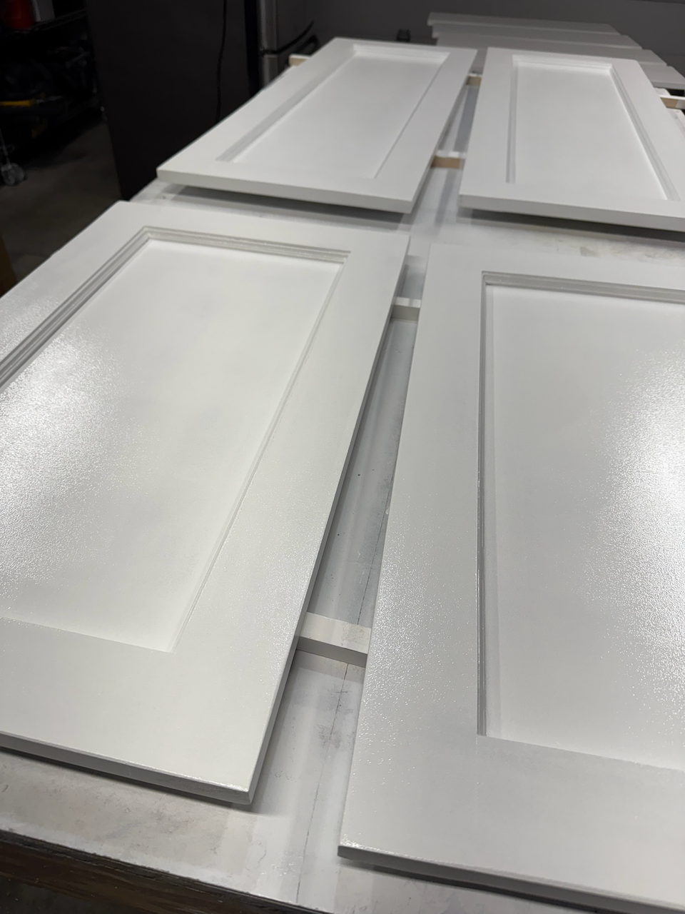 During: detail of the painted cabinet door panels.